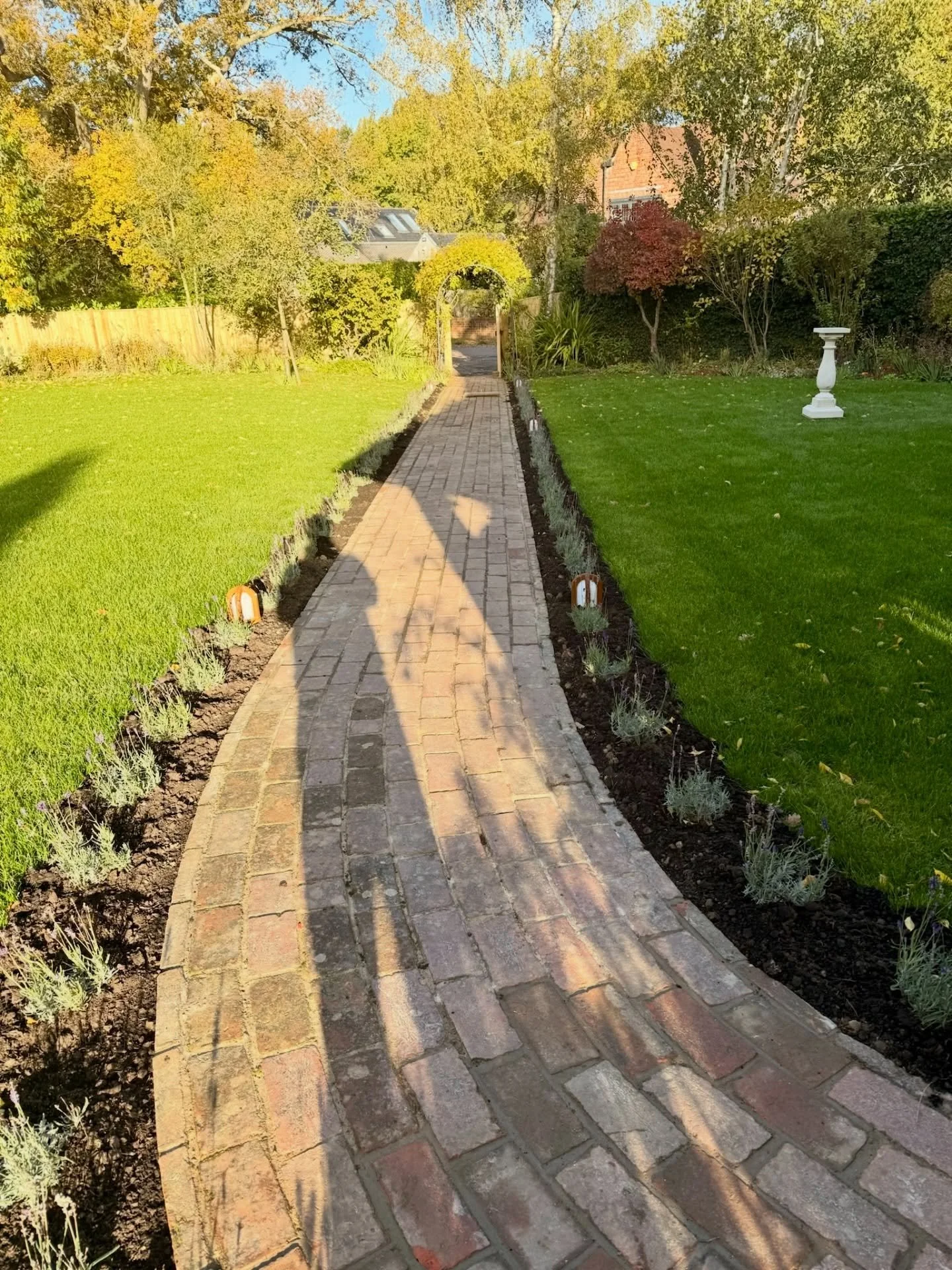 As part of a wider garden project, we refreshed an existing pathway rather than replacing it.

The original brickwork was carefully repaired and finished with a lavender hedge and subtle path lighting to soften the edges and lift the space.

Simple u