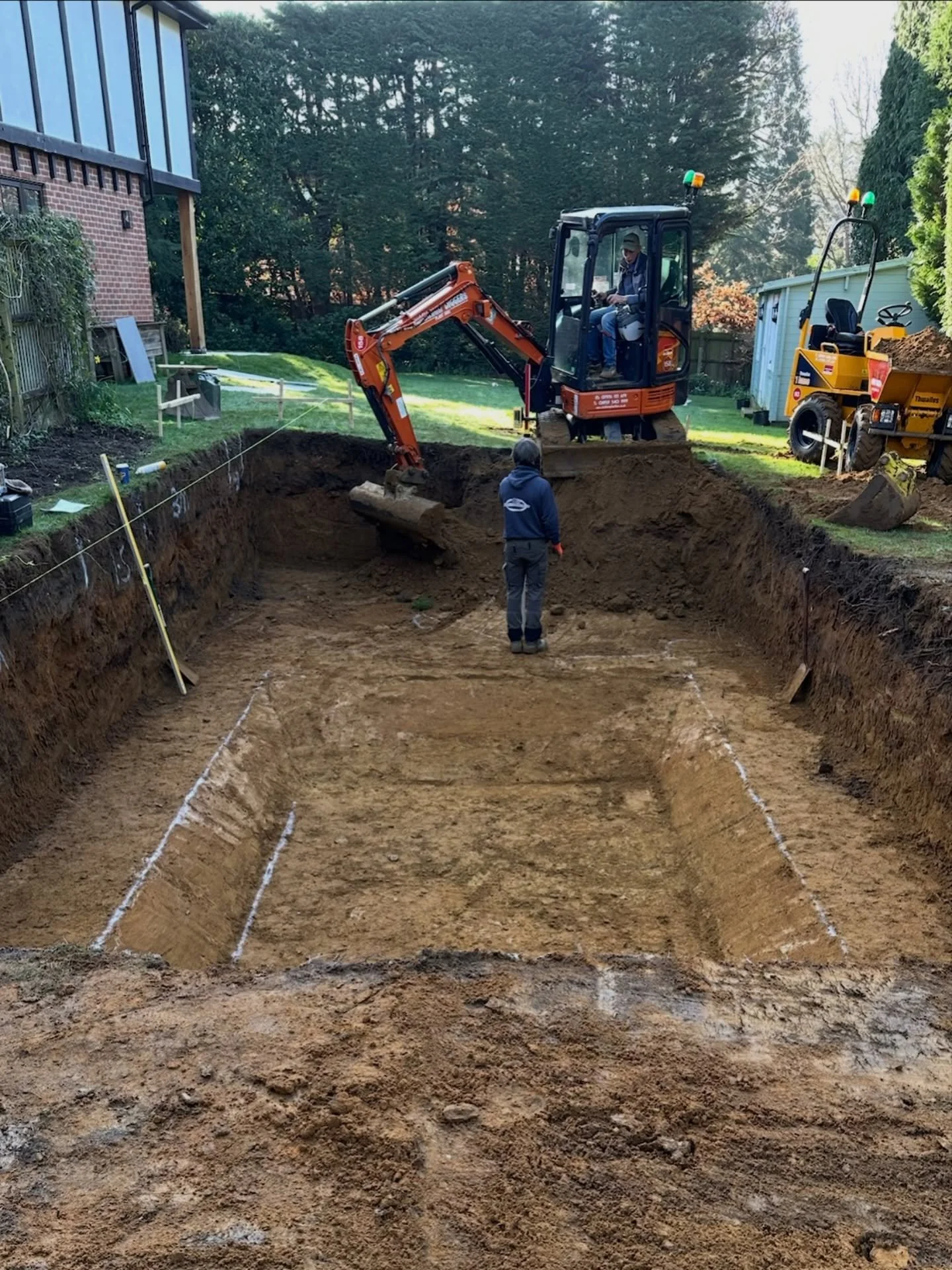 Before the finishes, the planting and the water, there&rsquo;s the groundwork. Excavation needs to be precise &mdash; every mark set out accurately so the pool sits exactly where it should.

With over 100 years of combined experience within this team