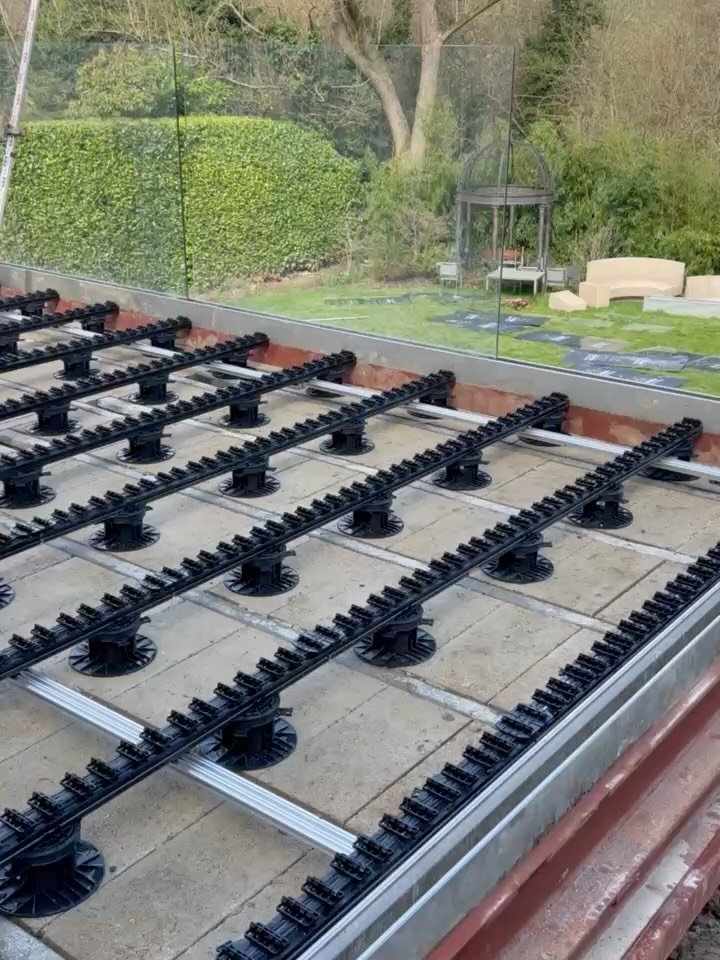 Not every terrace starts at ground level&hellip;

This one called for something a little more engineered.
A full steel I-beam frame installed to create the structure, followed by a block and beam system to form a solid, load-bearing base. From there,