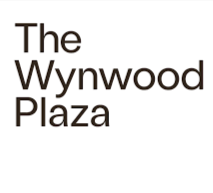 Text that reads 'The Wynwood Plaza' on a white background