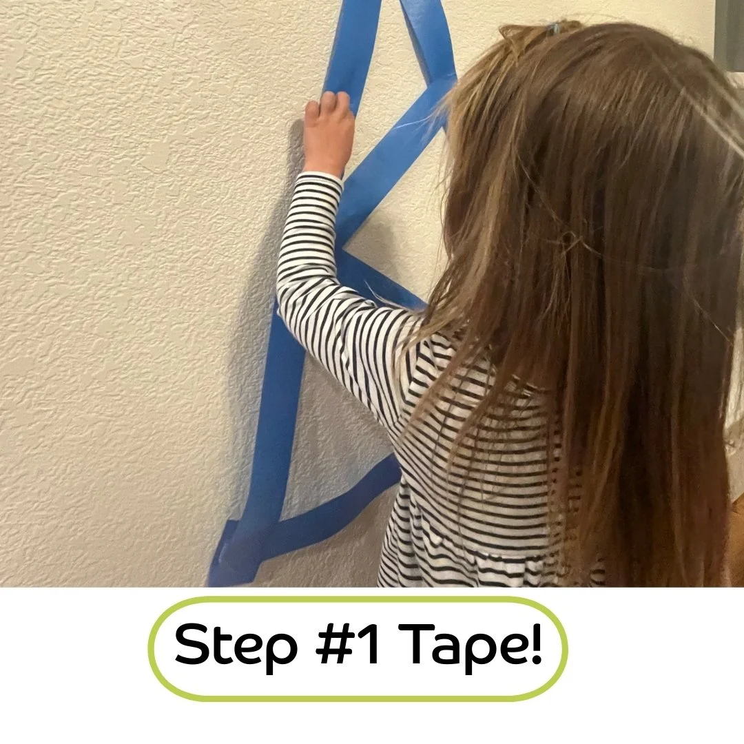 🎄✨ Decorate-A-TapeTree! ✨🎄

Here's a fun way to encourage fine motor skills this holiday season! Try this sticky holiday tree activity! ✨

Start by sticking painter's tape to the wall in the shape of a tree&mdash;using double-sided tape helps keep 