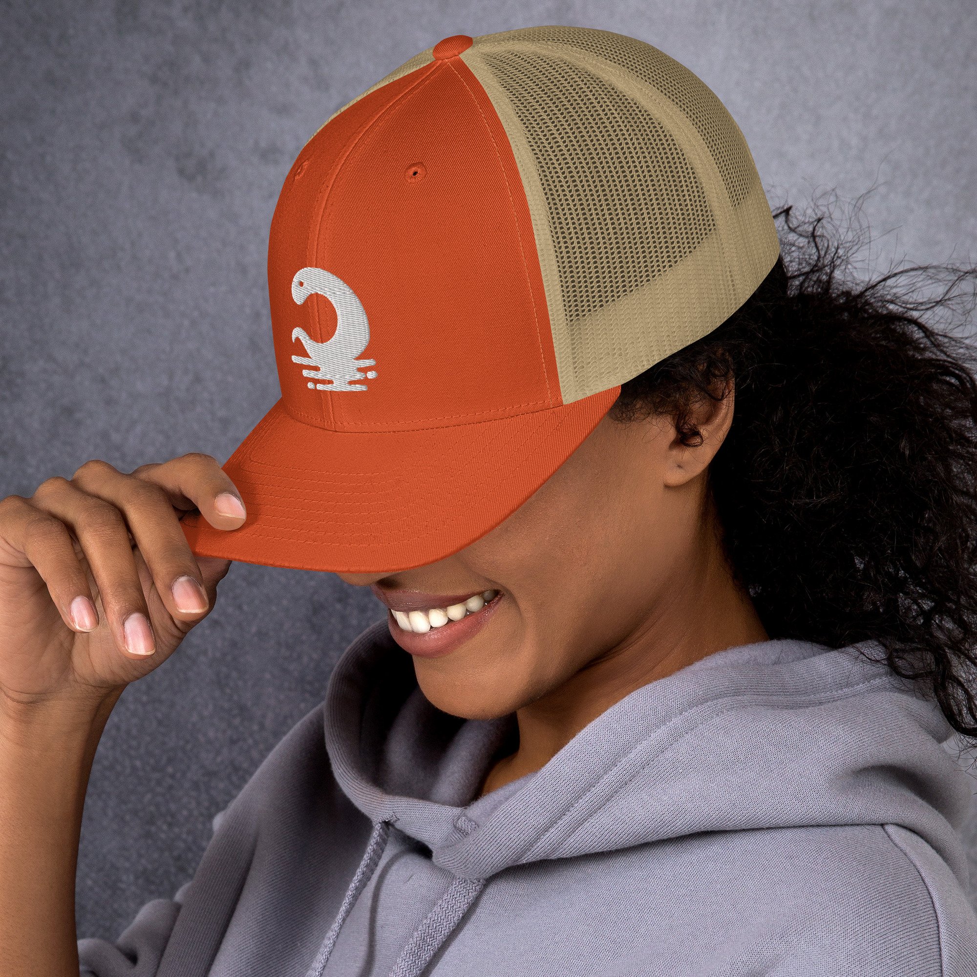 retro-trucker-hat-rustic-orange-khaki-left-65f1a7aae9a7f.jpg