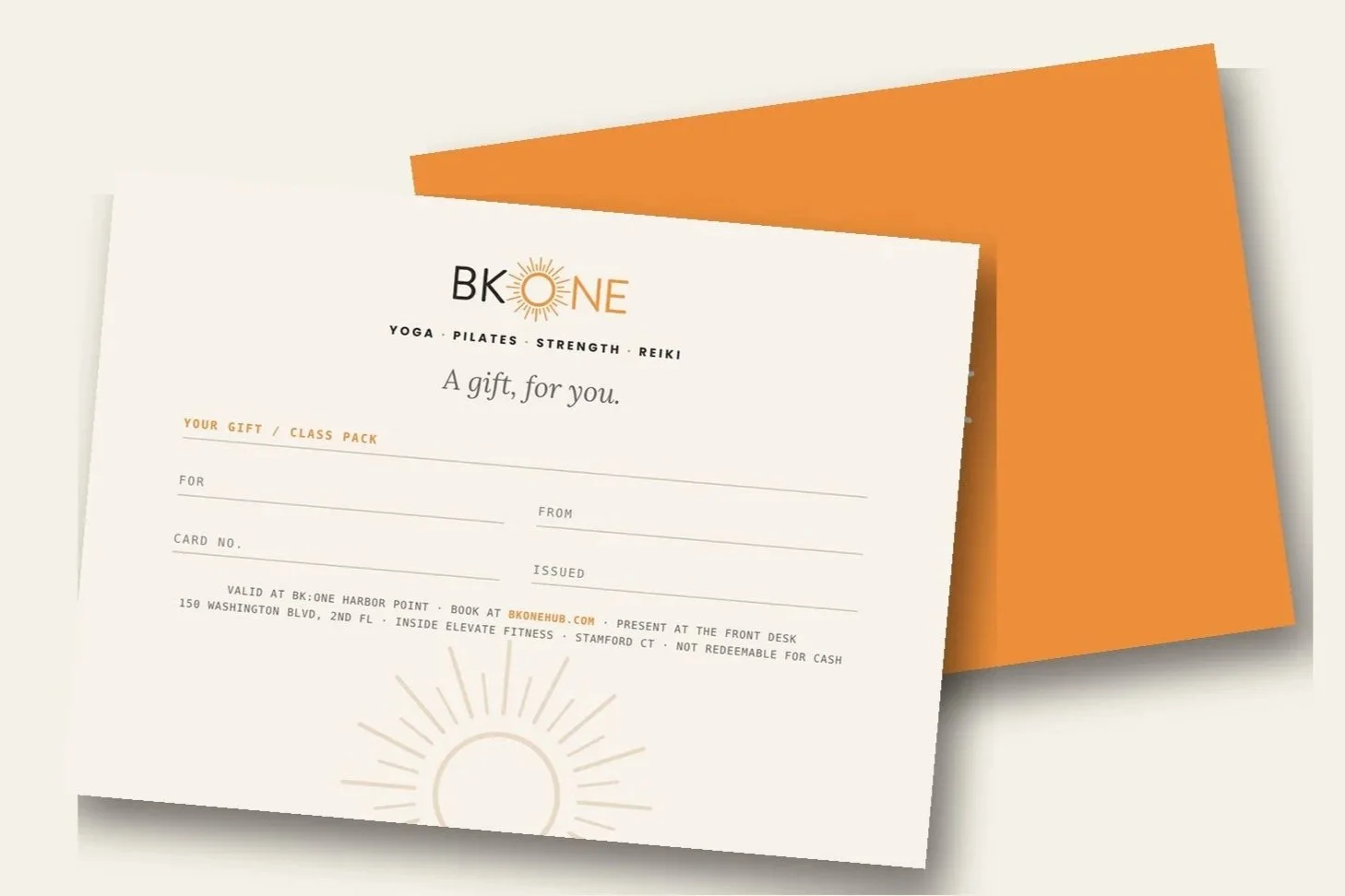 BK:ONE gift card with an orange envelope for yoga, Pilates and restore classes in Stamford, CT