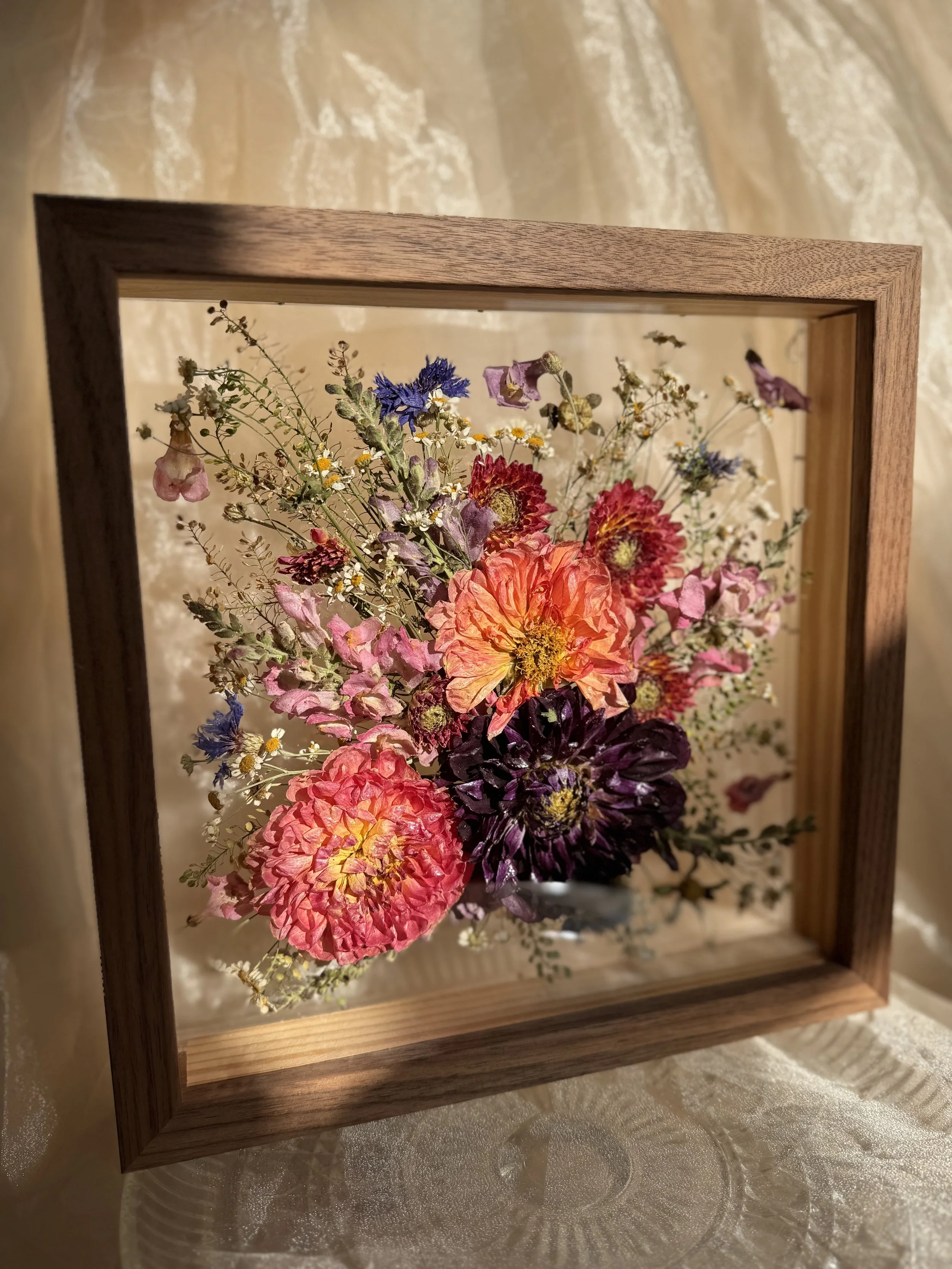 preserved flowers in walnut frame