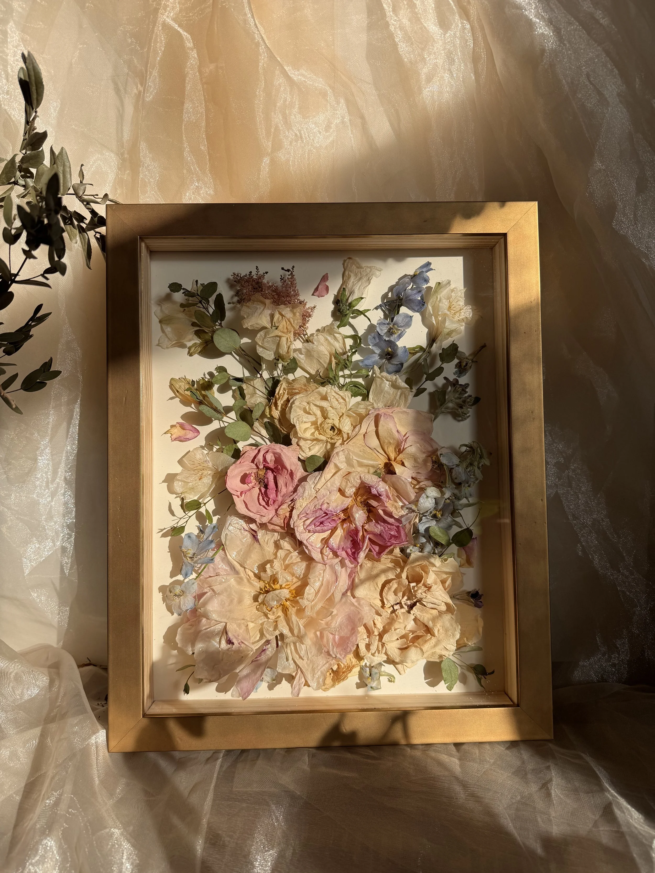 preserved flowers in a shadowbox