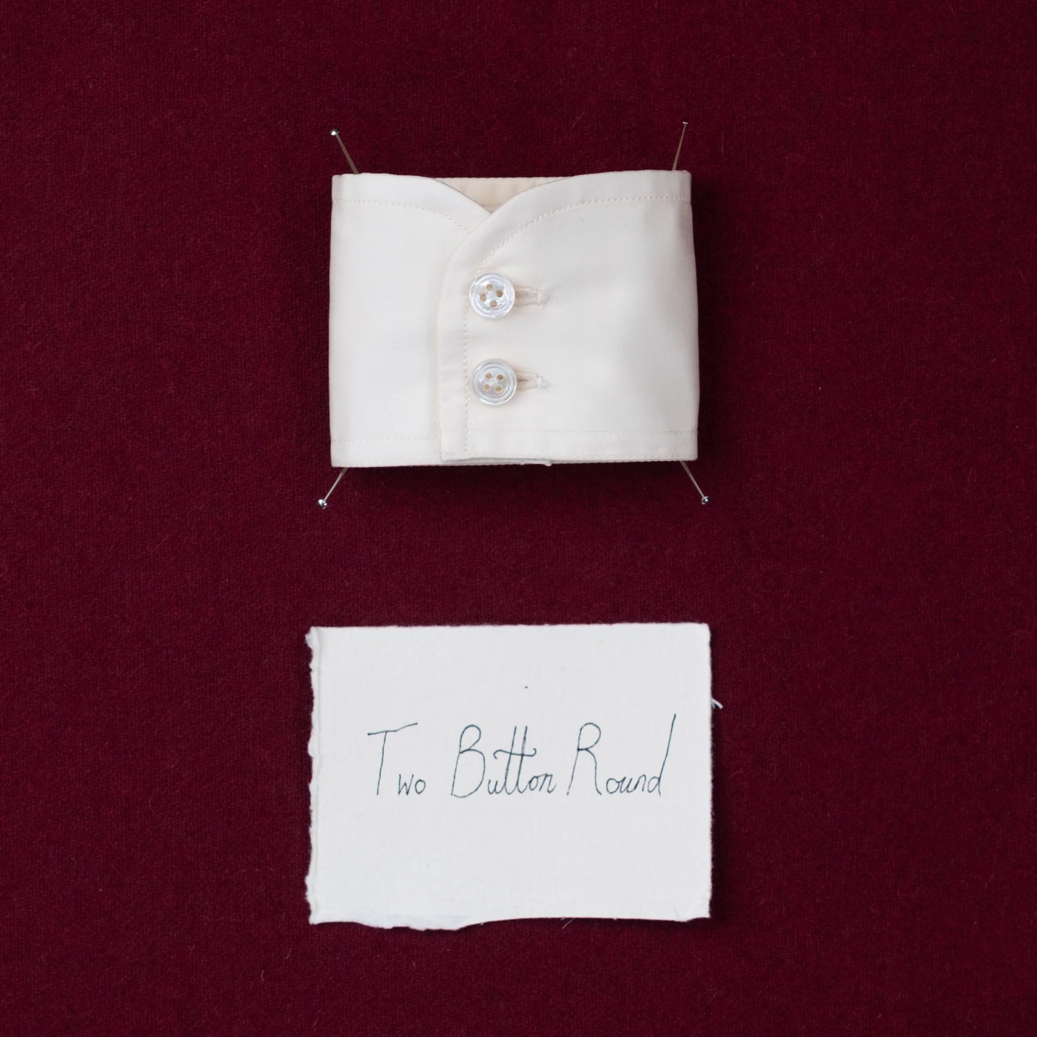 Classic
Button Round
One or Two Button,
The most commonly seen variant of the button cuff, the rounded design softens the look making the shirt feel more relaxed,
and is practical and easily styled. The rounded edge reduces the bulk giving some longe