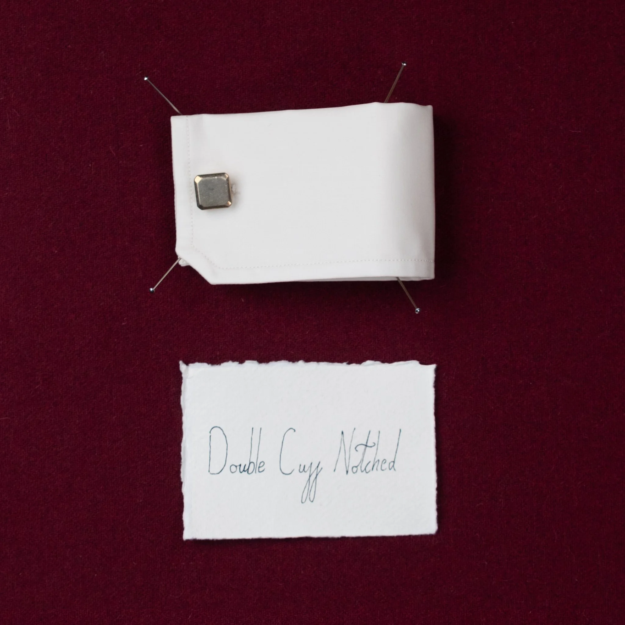 Double Cuff
Square, Notched or Round,
Called the double cuff because the cloth folds back doubling up the layers and creating a clean line at the end
of the sleeve. Seen as the most formal cuff due to the addition of jewellery in the way of cufflinks