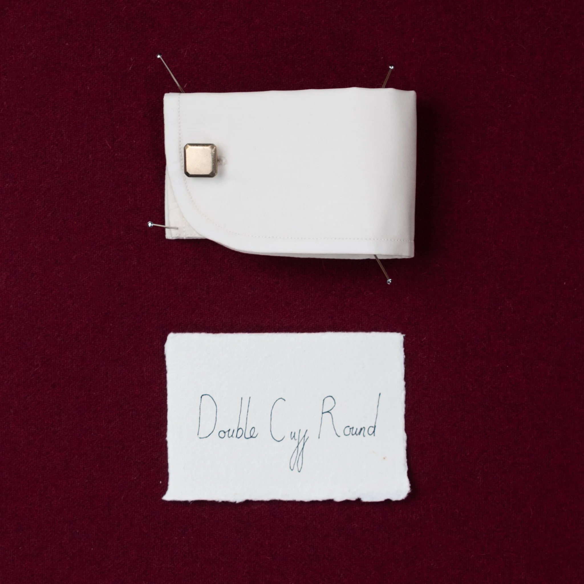 Double Cuff
Square, Notched or Round,
Called the double cuff because the cloth folds back doubling up the layers and creating a clean line at the end
of the sleeve. Seen as the most formal cuff due to the addition of jewellery in the way of cufflinks
