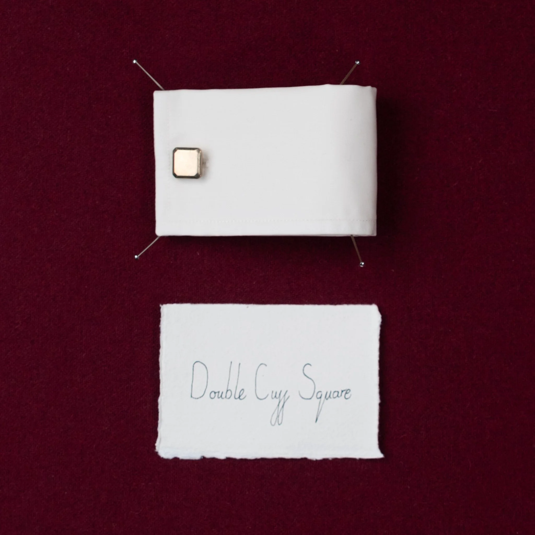 Double Cuff
Square, Notched or Round
Called the double cuff because the cloth folds back doubling up the layers and creating a clean line at the end
of the sleeve. Seen as the most formal cuff due to the addition of jewellery in the way of cufflinks.