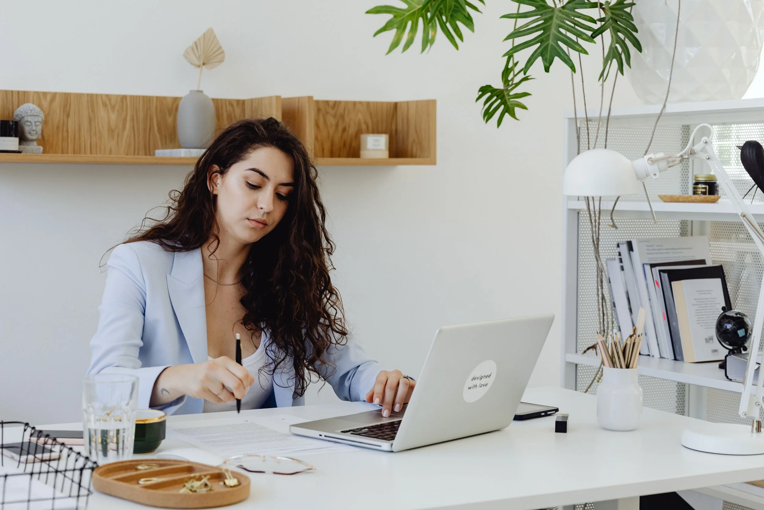 Business owner working calmly at an organized desk after an operations audit