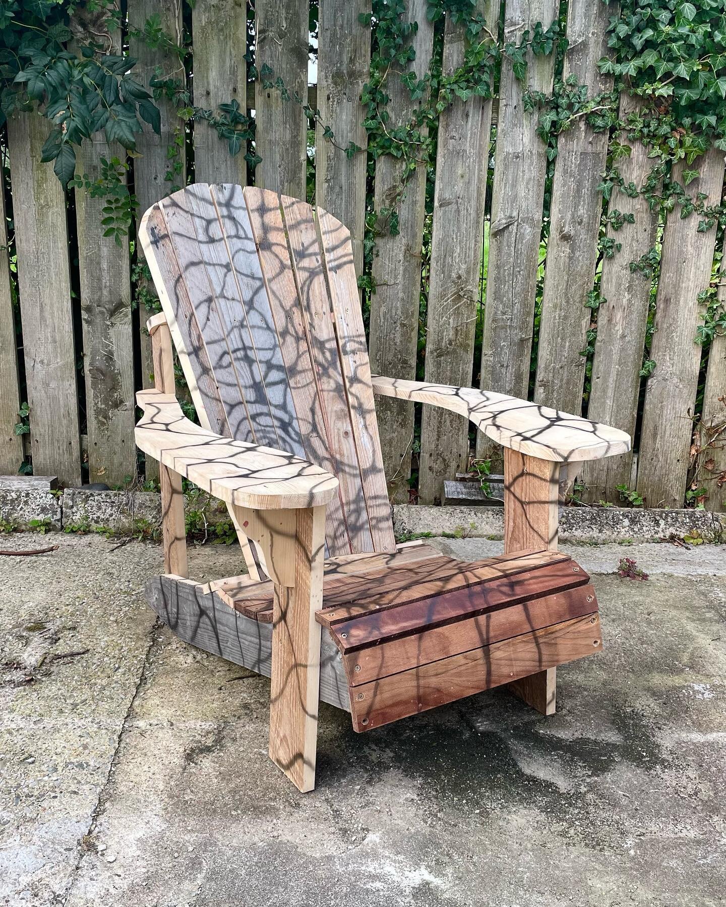 custom airbrushed adirondack made from recycled pallets and factory offcuts. left the planks unsanded for more colour variation