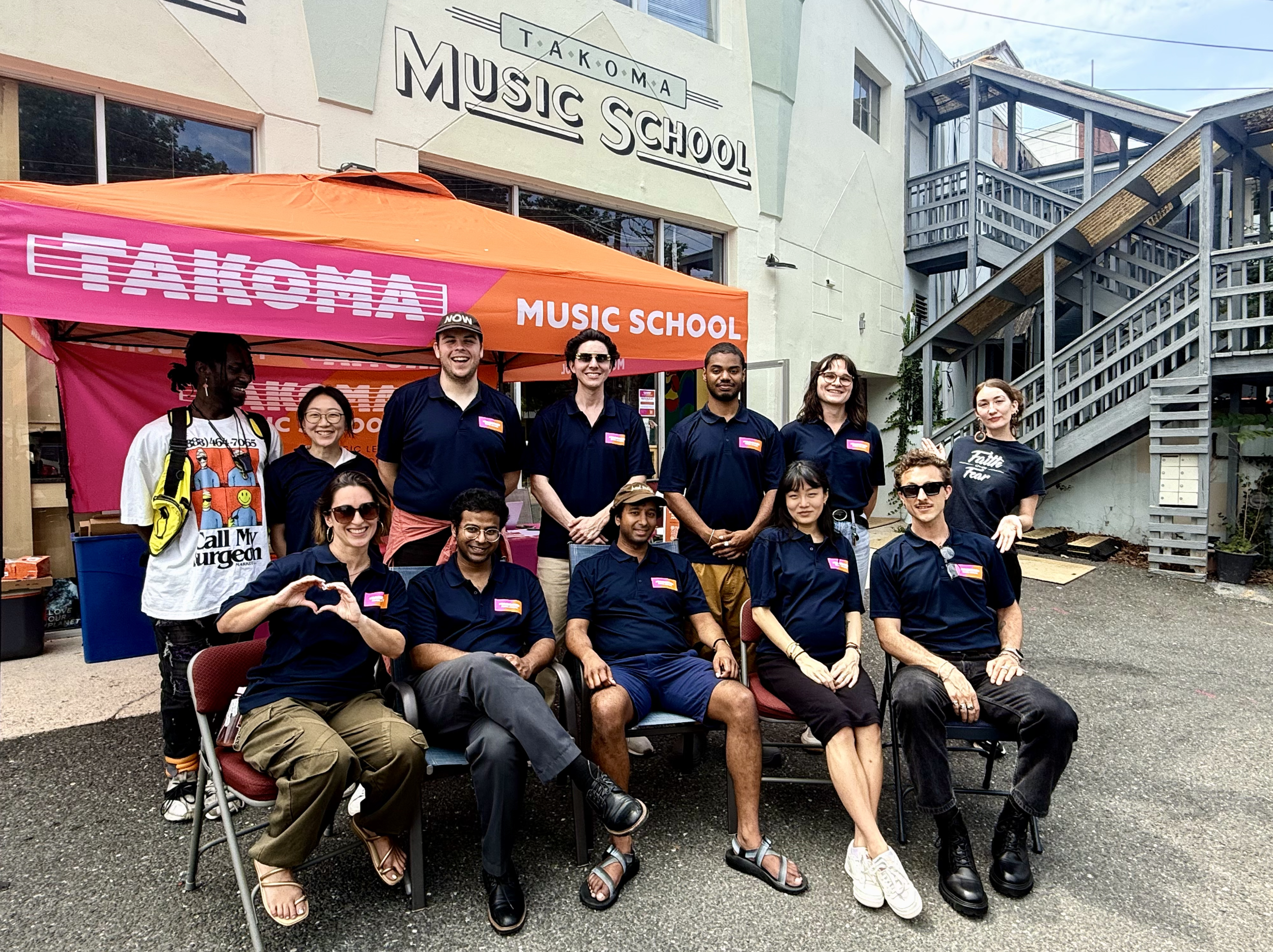 Takoma Music School staff and instructors celebrating their one year anniversary
