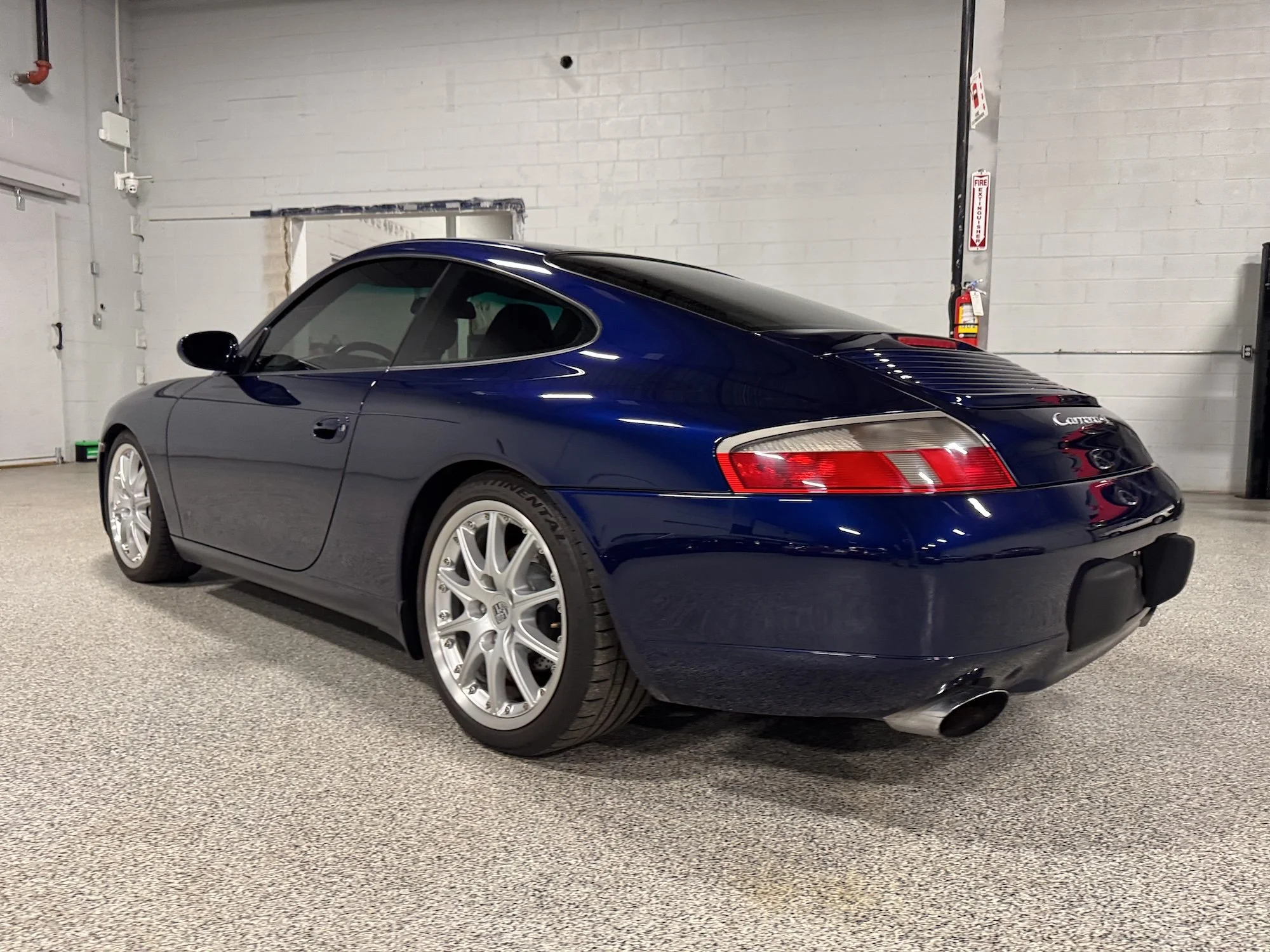 2001_Porsche_966_Carrera_Left_Rear.jpg