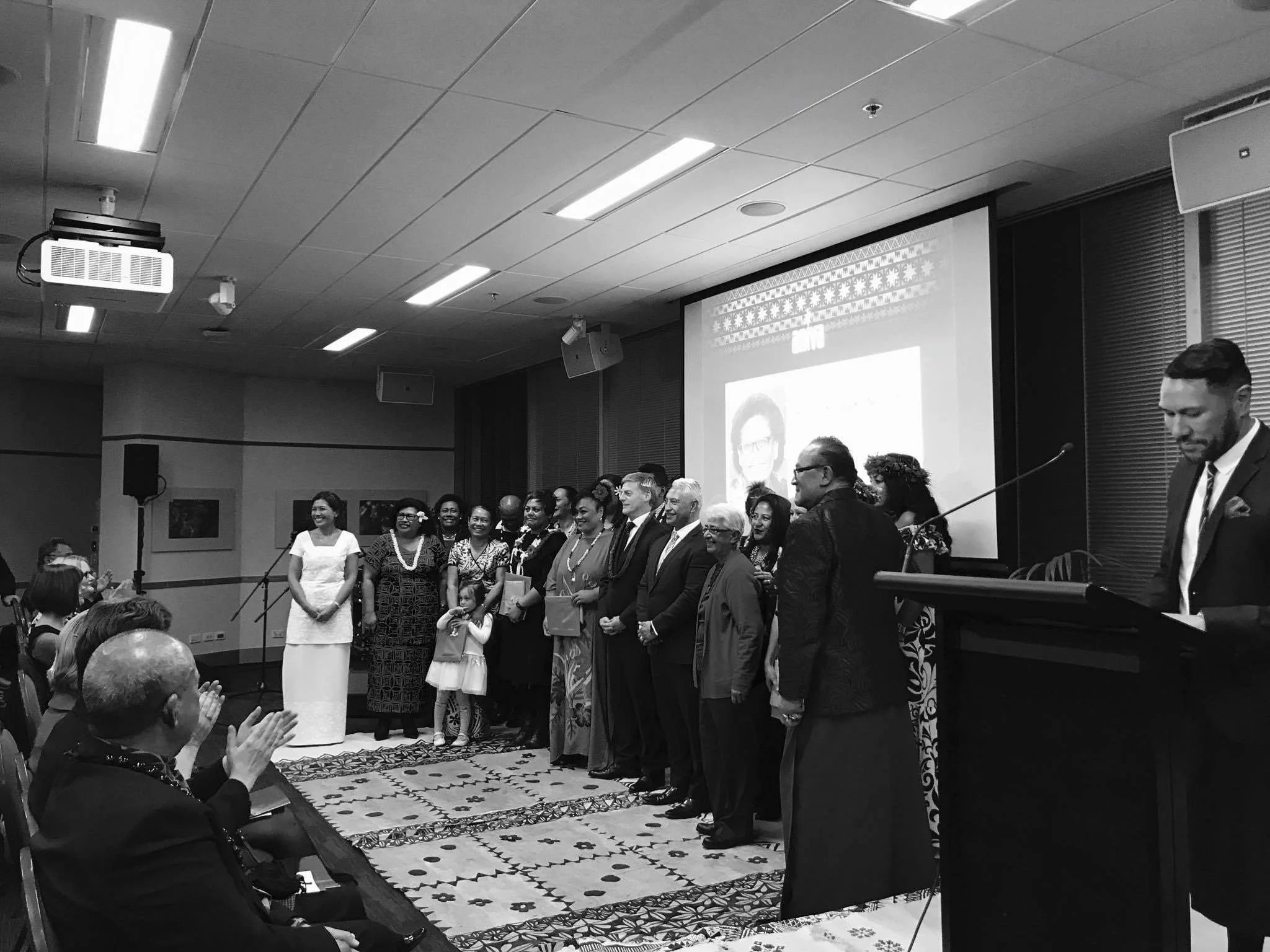 Andre Afamasaga MC'ing the Aniva graduation with Dr Debbie Ryan of Pacific Perspectives and then Prime Minister Bill English and MP Alfred Ngaro at Te Papa