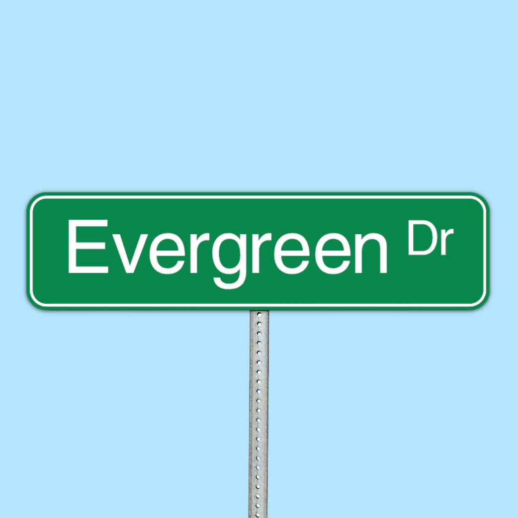Green street sign reading 'Evergreen Dr' against a blue sky background.