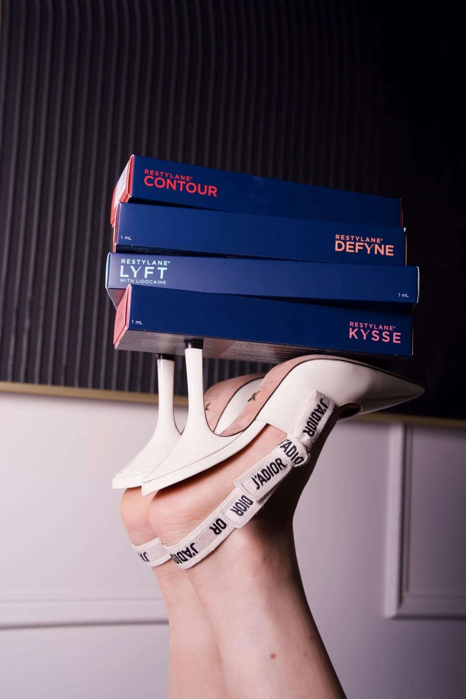 Syringe near a classical sculpture head