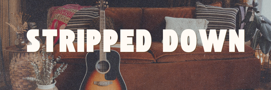 Music-inspired portrait set featuring a couch and guitar, designed for the laid-back editorial style of Stripped Down Sessions at Love Street Pictures.