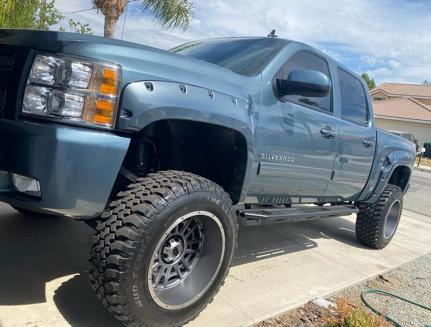 2011 lifted Blue Chevy silverado truck