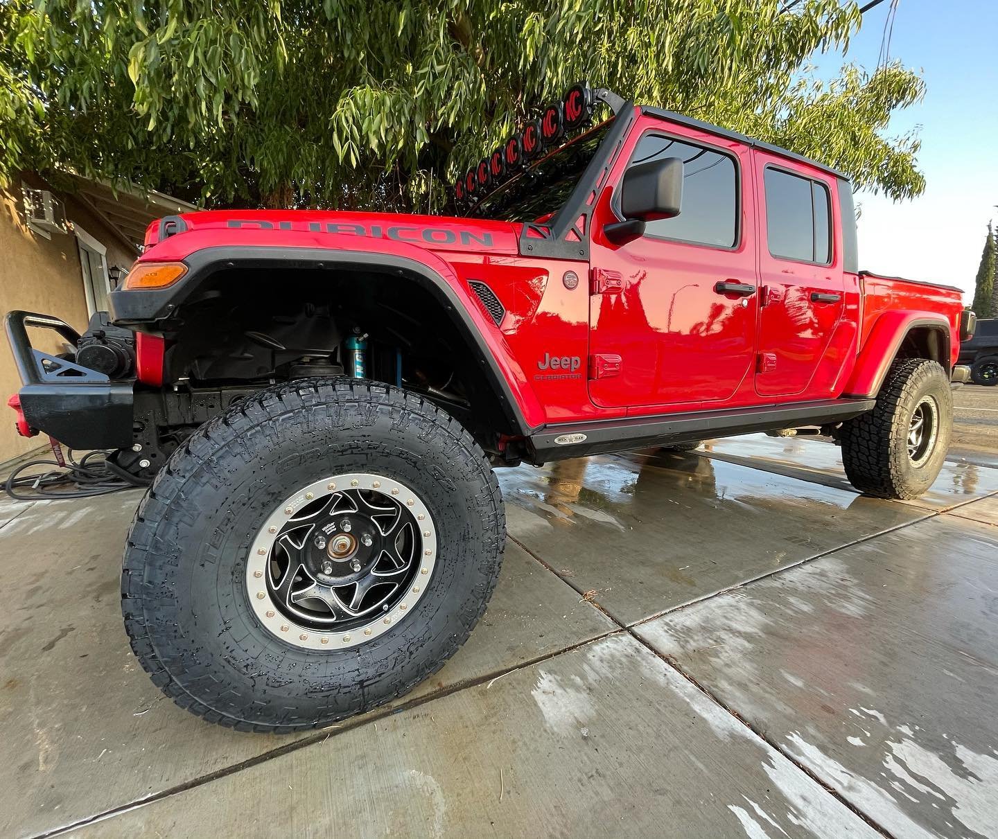 Red Jeep Gladiator with suspension kit