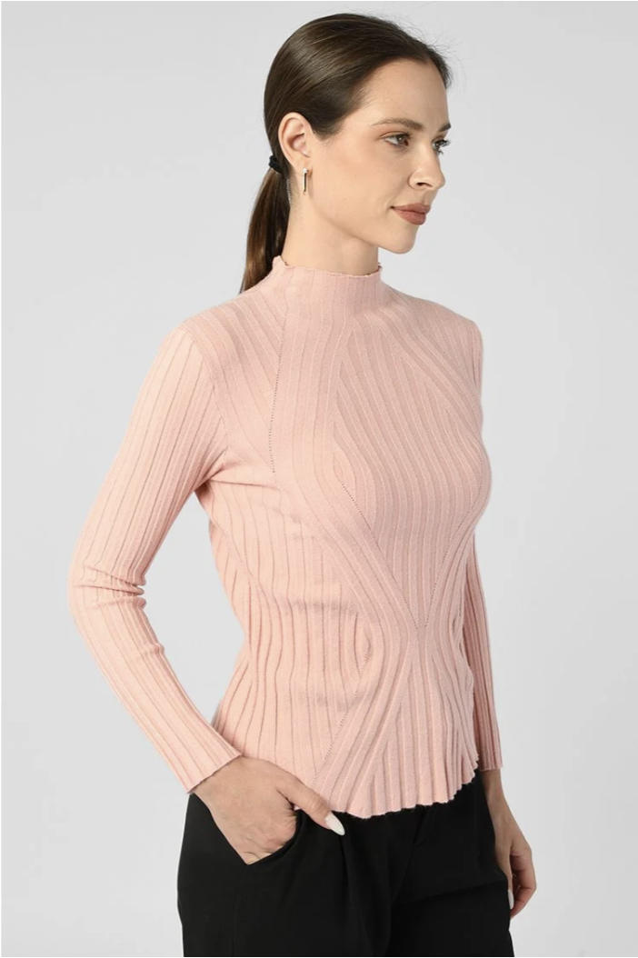 Model wearing pink long sleeved mock neck shirt (Copy)
