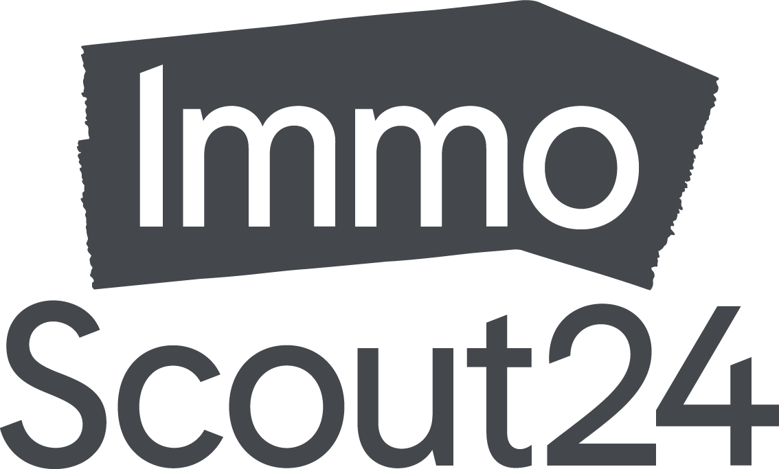 Grafik mit dem Text 'Immo Scout24' in schwarz und grau, das Logo eines Immobilienportals.