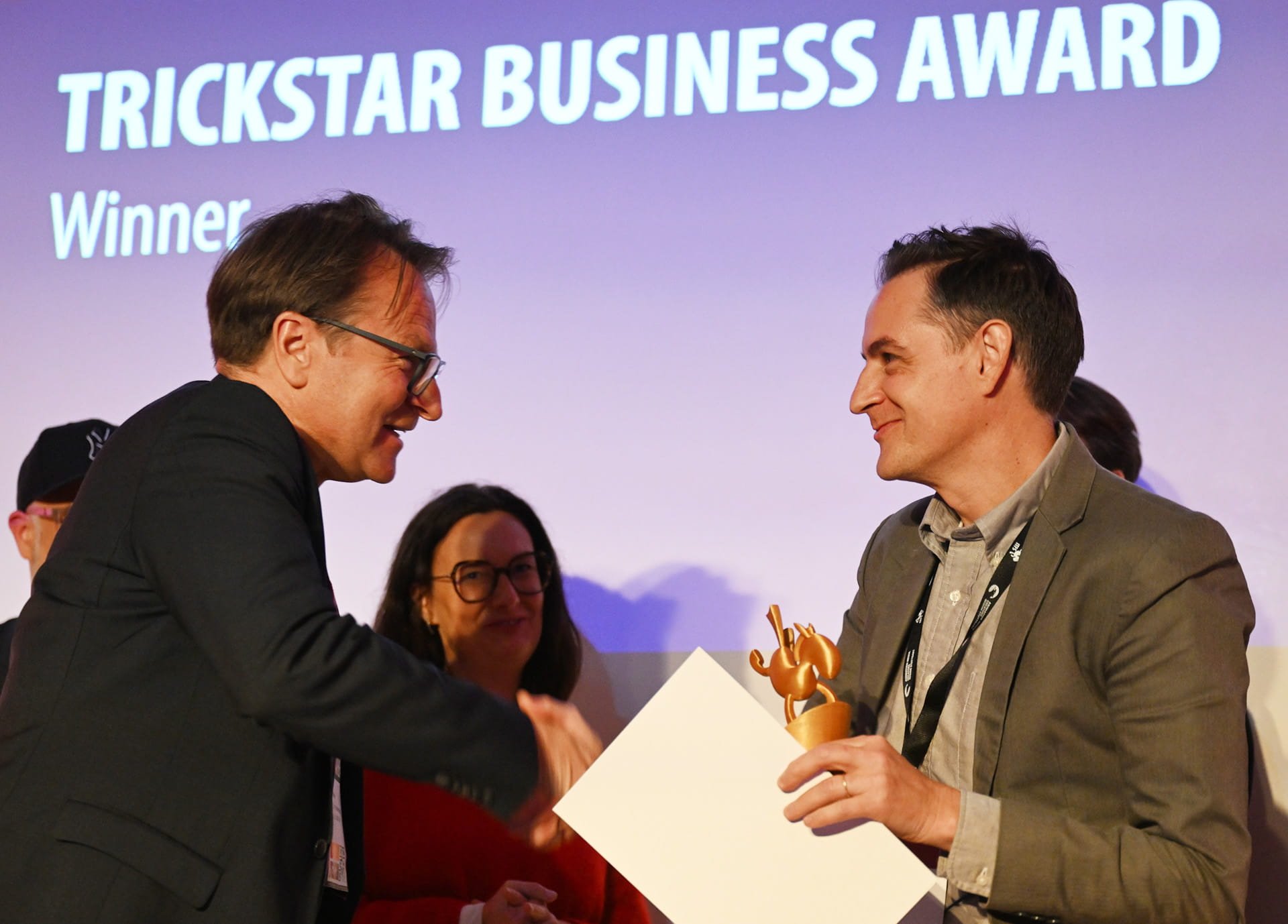 Atomedge CEO/Founder, Guy van der Walt accepts the best innovative and groundbreaking business award in Stuttgart, Germany (Photo © Reiner Pfisterer)