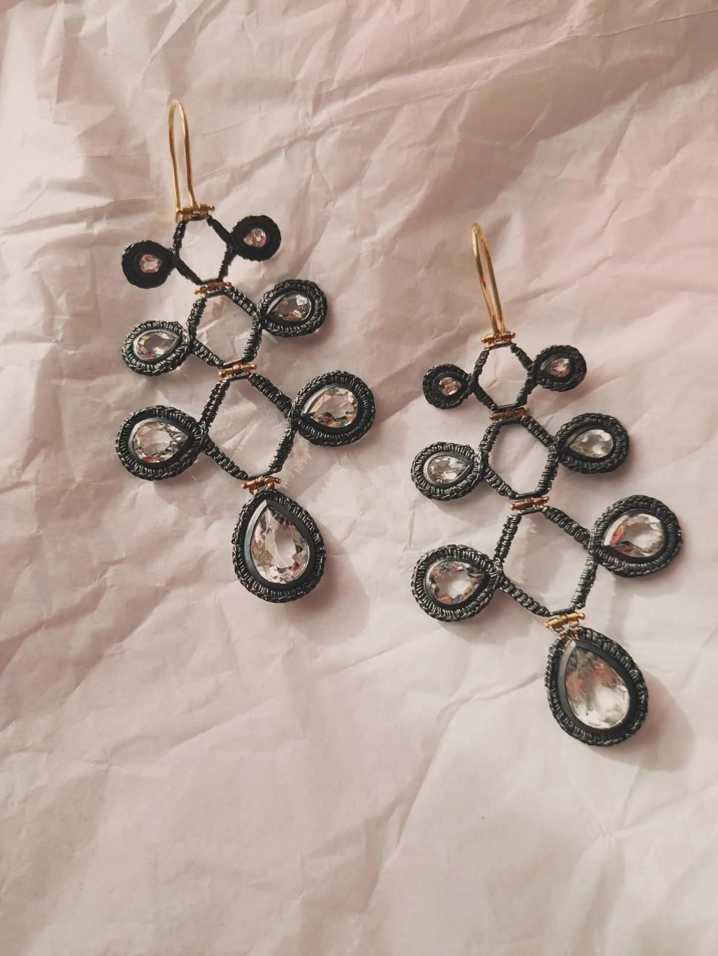 Oxidised Silver, 18ct Gold and Rock Crystal Regency Chandelier Earrings. Each component stitched in cotton and cast in solid silver. The gold hinges give extra movement to these mega statement earrings.