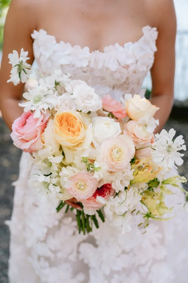 my-lake-como-wedding-planning-planner-expert-italy-lace-floral-strapless-dress-pink-peach-white-flowers-bouquet