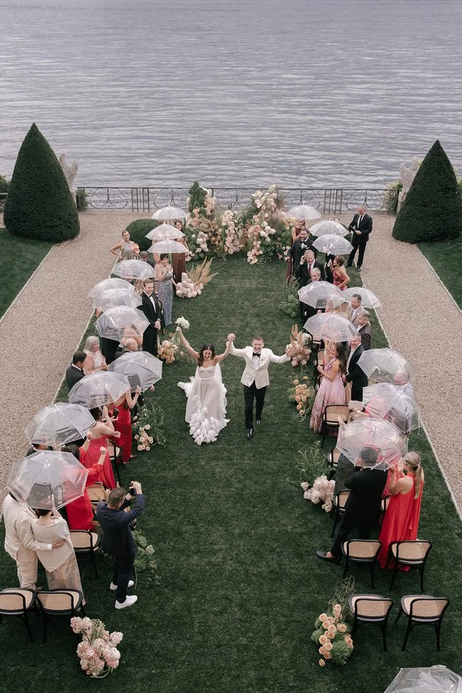 my-lake-como-wedding-italy-planner-bride-groom-walking-down-aisle-married-lake-guests-celebrating