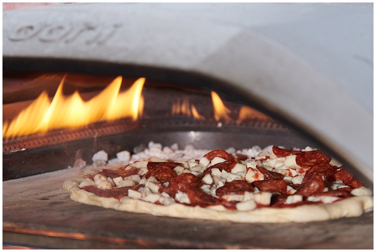 pizza-being-cooked-at-glamping-festival.jpg