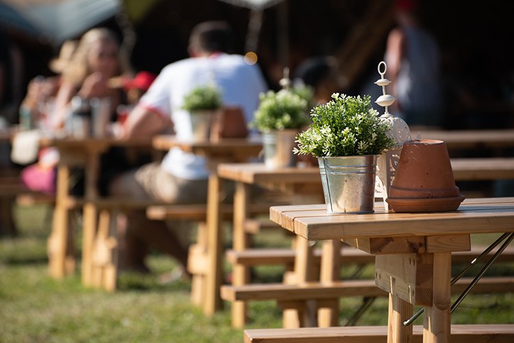 flowers-on-tables-at-glamping-festival.jpg