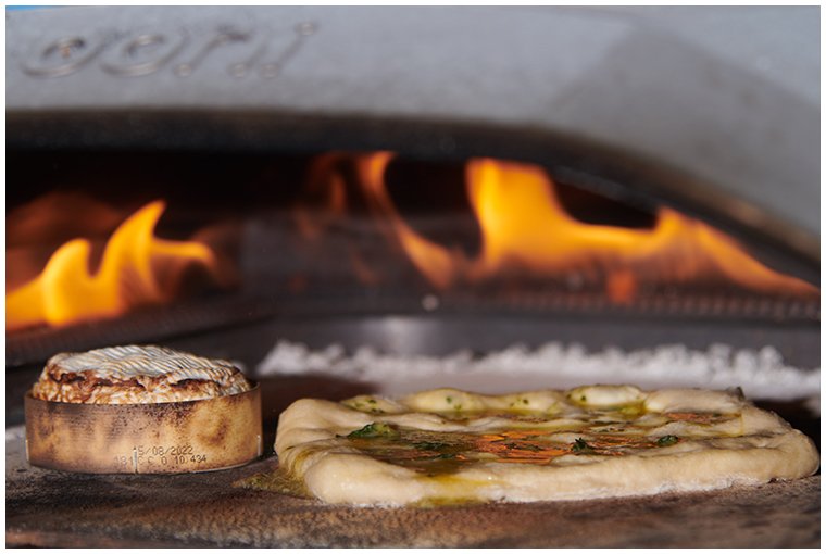 pizza-and-cheese-being-cooked-at-glamping-festival.jpg
