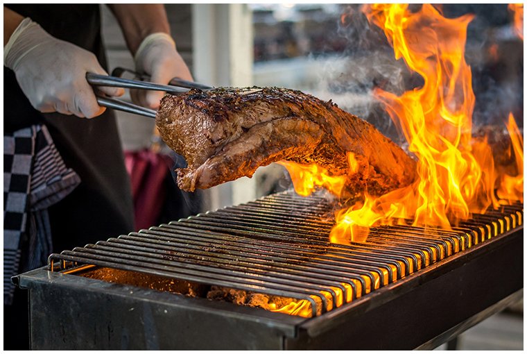 leg-of-lamb-being-barbecued-at-festival-evengt.jpg