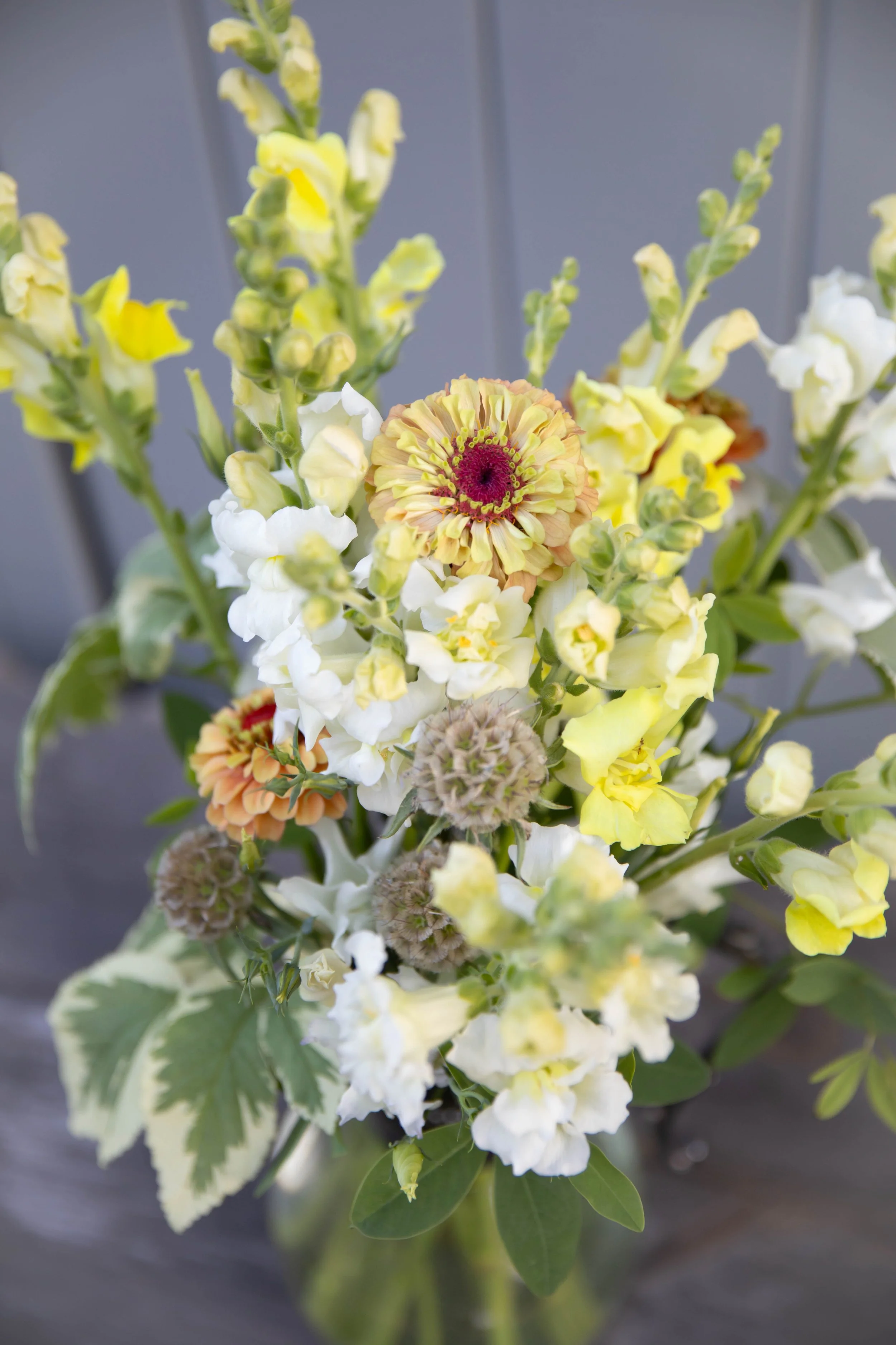 business vase yellow flowers.jpg