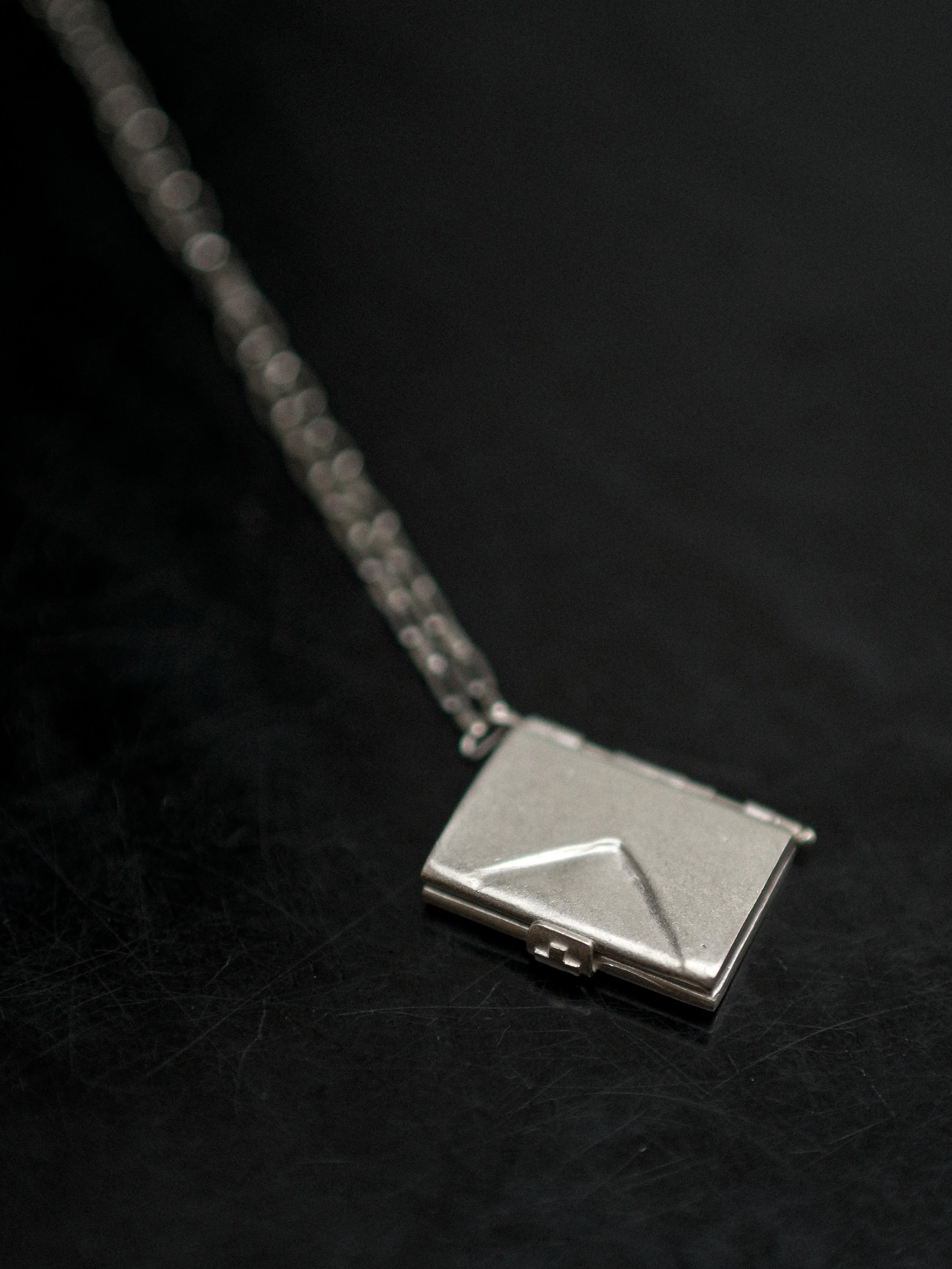 m.a+ Silver Wallet Necklace