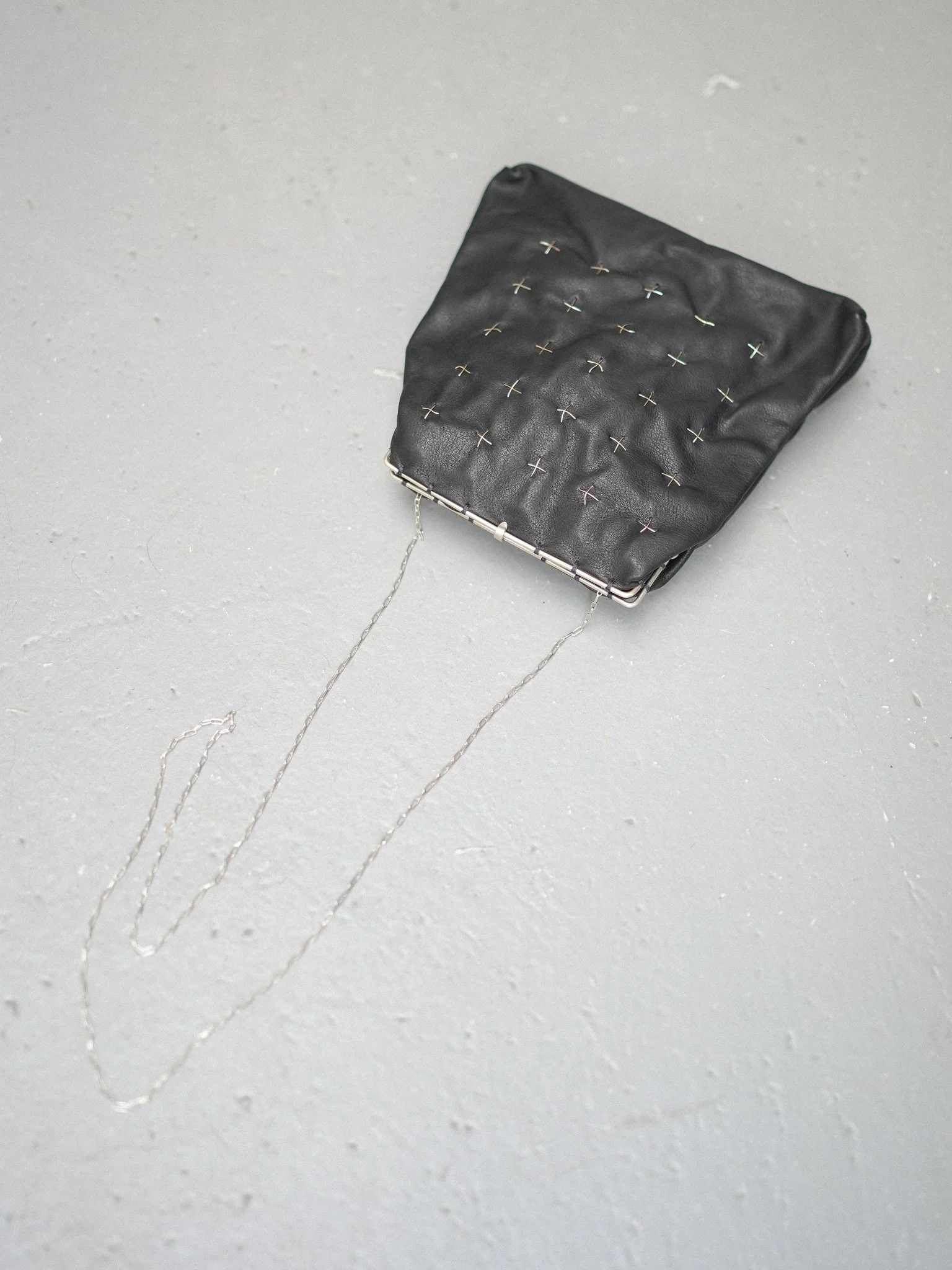 m.a+ Small Silver Rim Silver Cross Stitched Messenger Bag