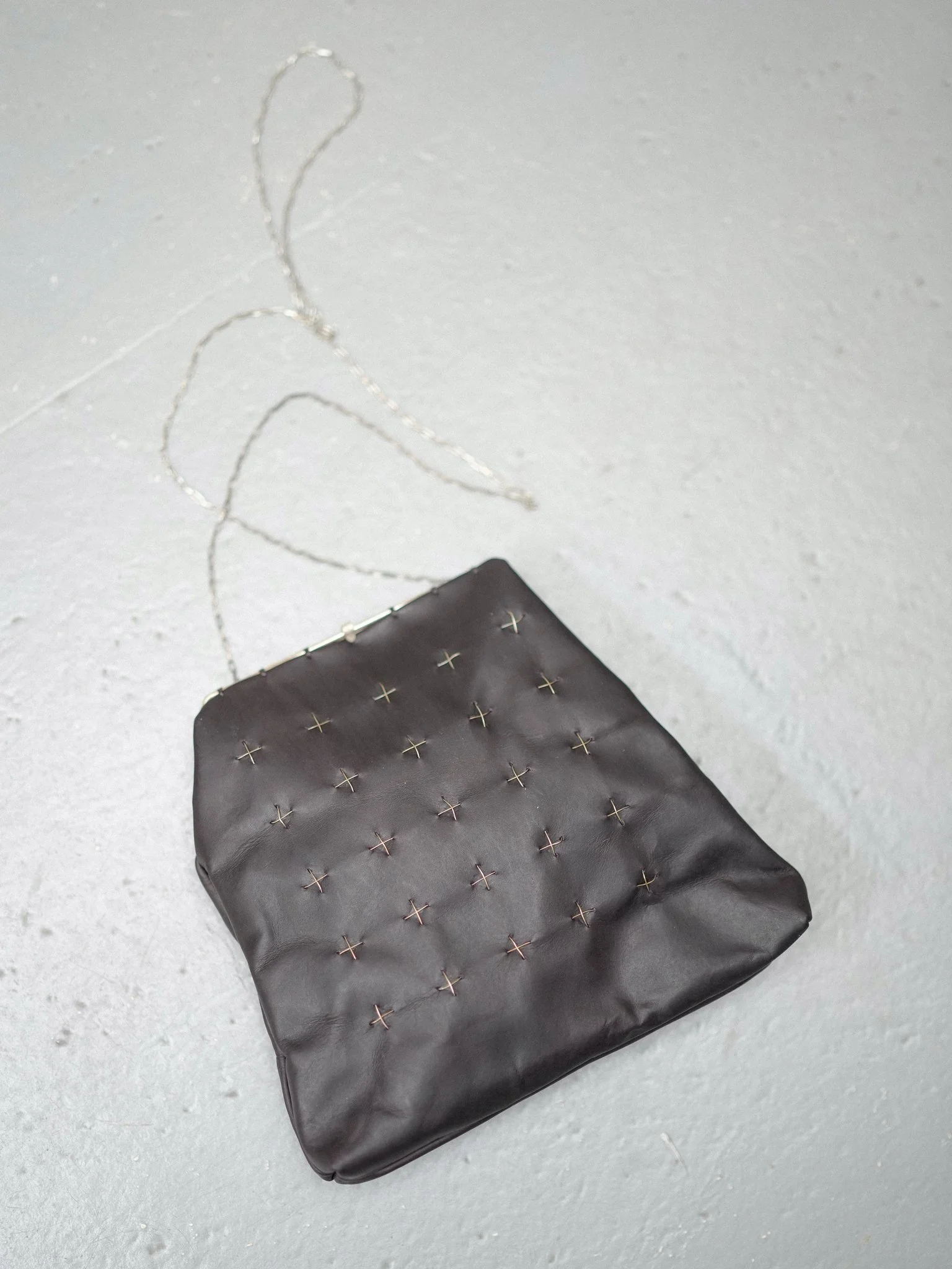 m.a+ Small Silver Rim Silver Cross Stitched Messenger Bag