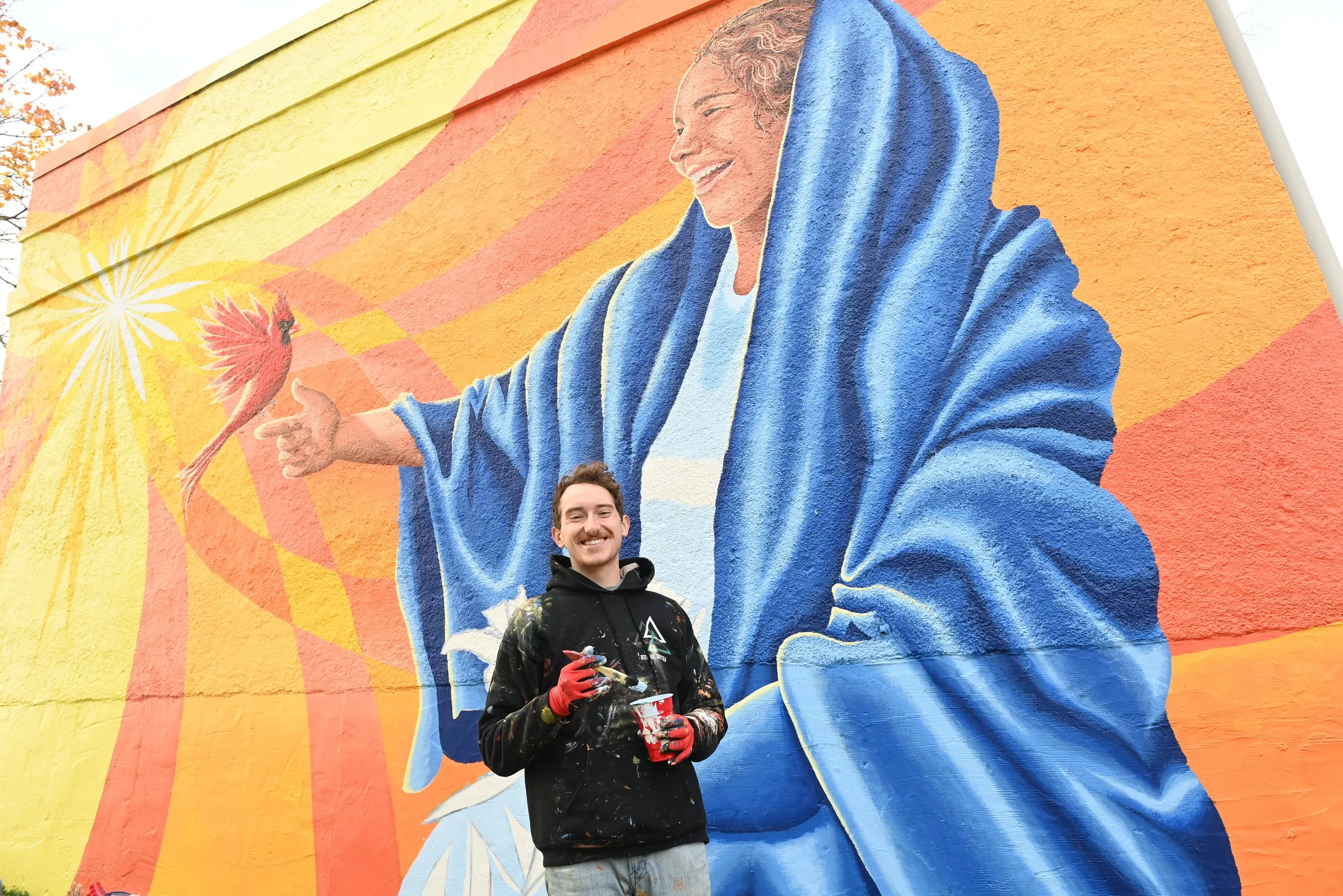 student painting the Virgin Mary