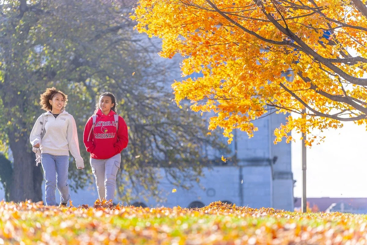 walking on campus in the fall