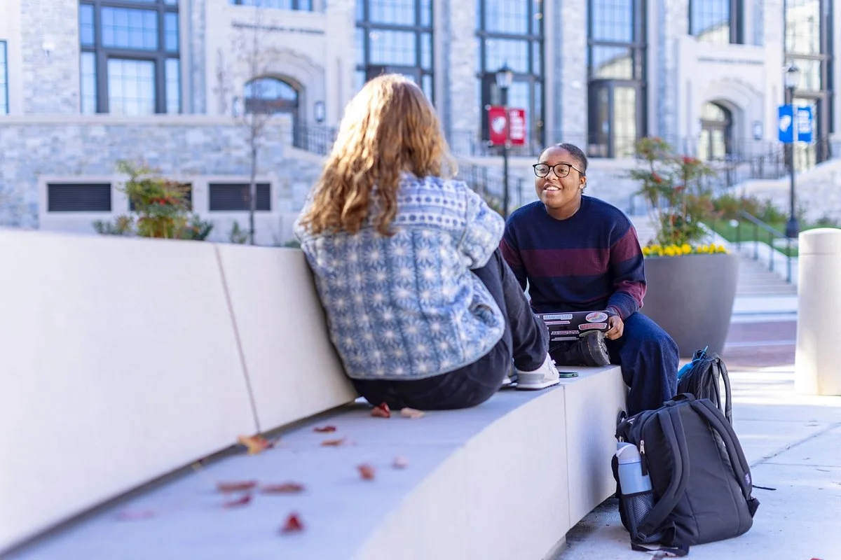 students outside nursing building