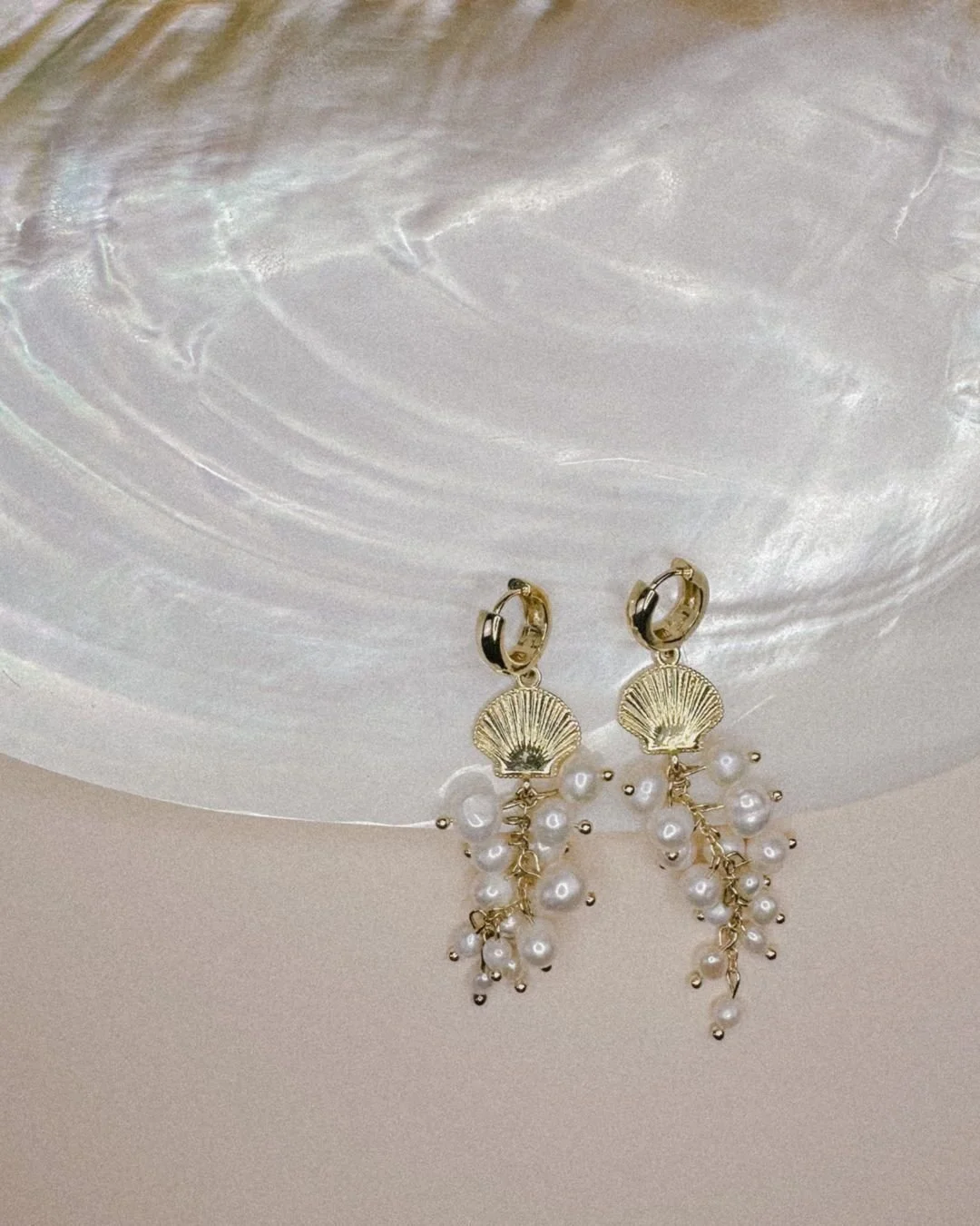 Mer: the French word for sea. These earrings are an homage to the ocean&rsquo;s gentle movement&mdash;organic, flowing, and perfectly imperfect.