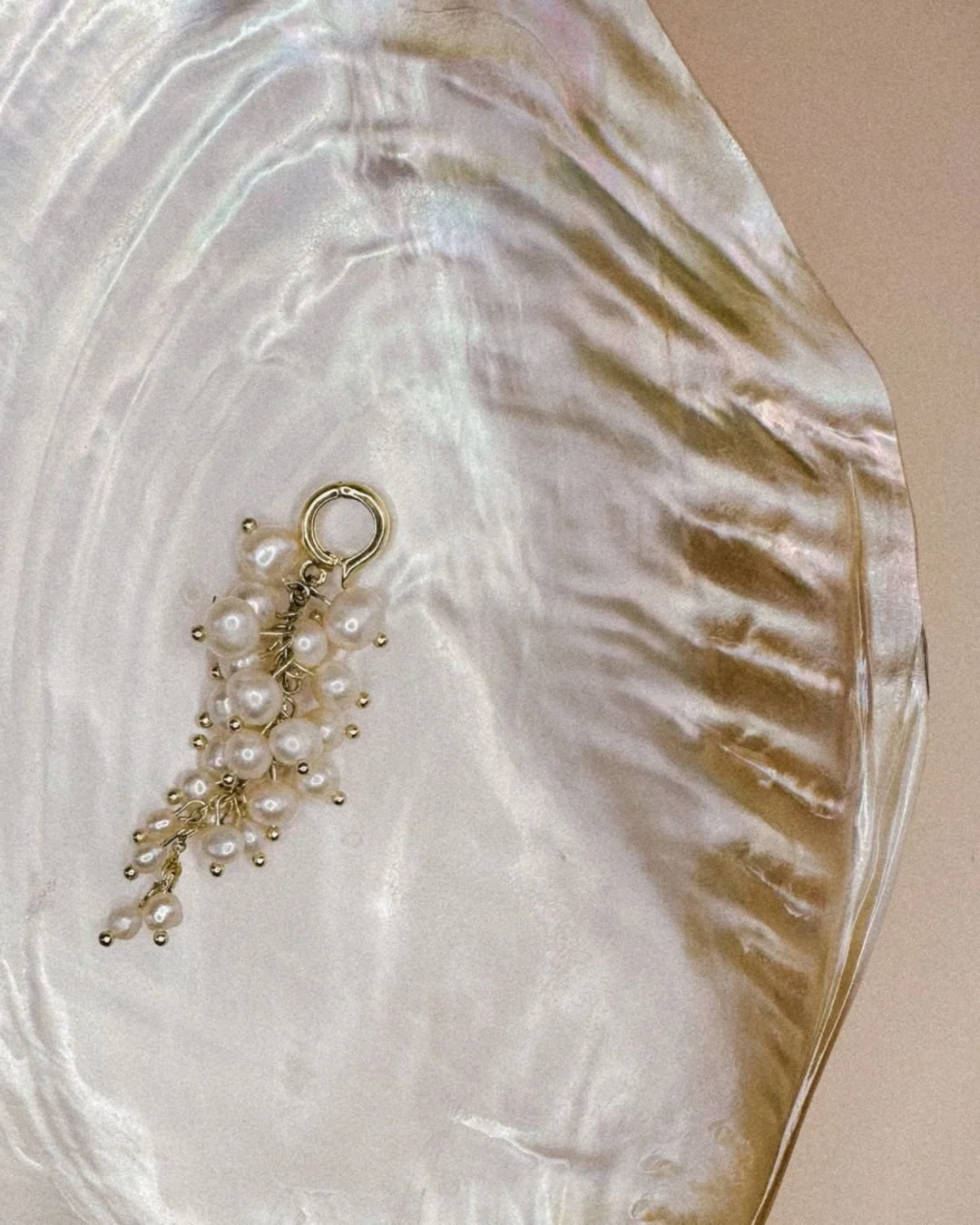 Our Strand bikini charm is timeless perfection&mdash;made 14K Gold-Filled so its elegance lasts through every wave and sunset. #earthtojuliet #smallbusiness #shopsmall #bikinicharms