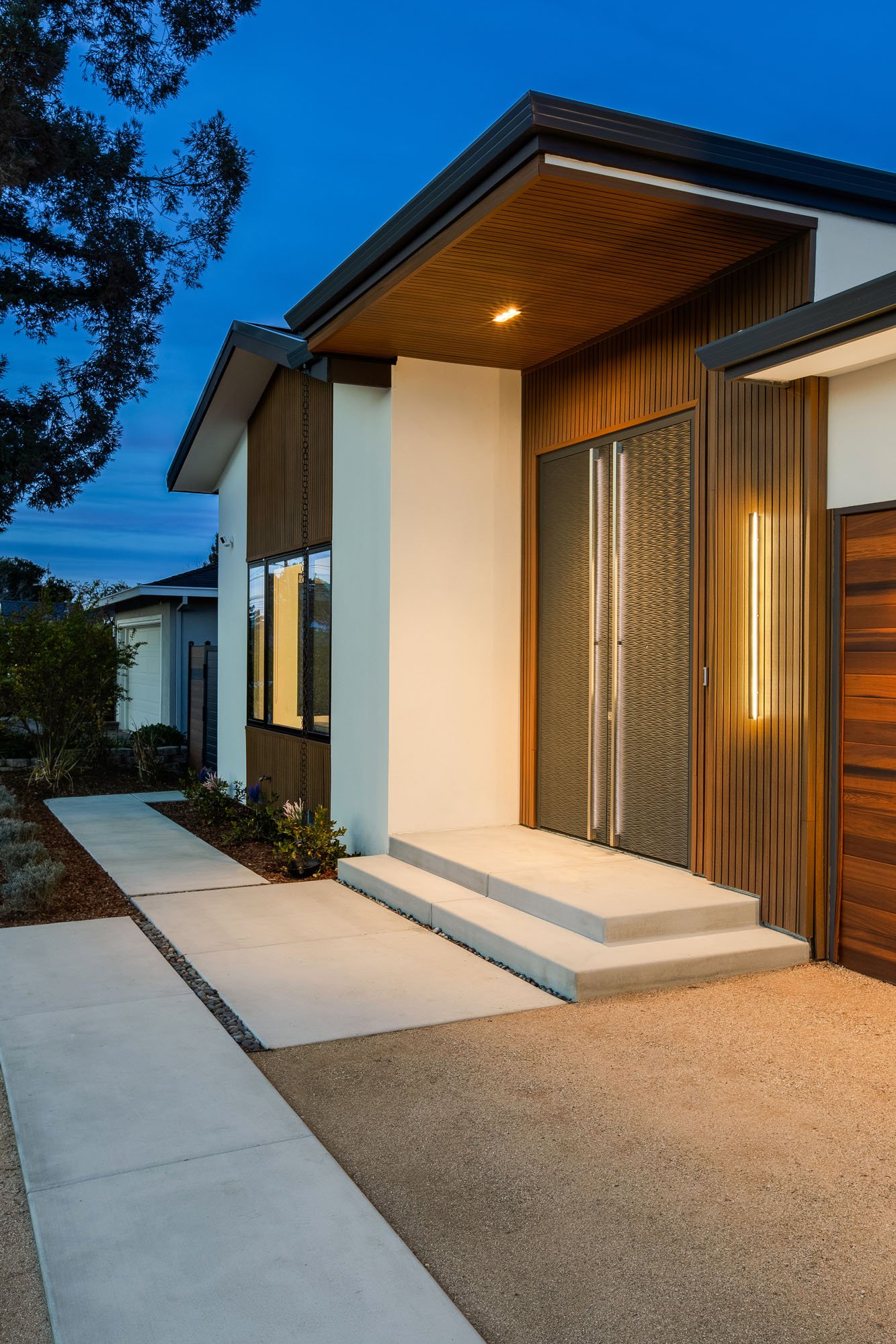 ojanen-chiou-architects-residential-remodel-addition-cupertino-entry-twilight-1.jpg