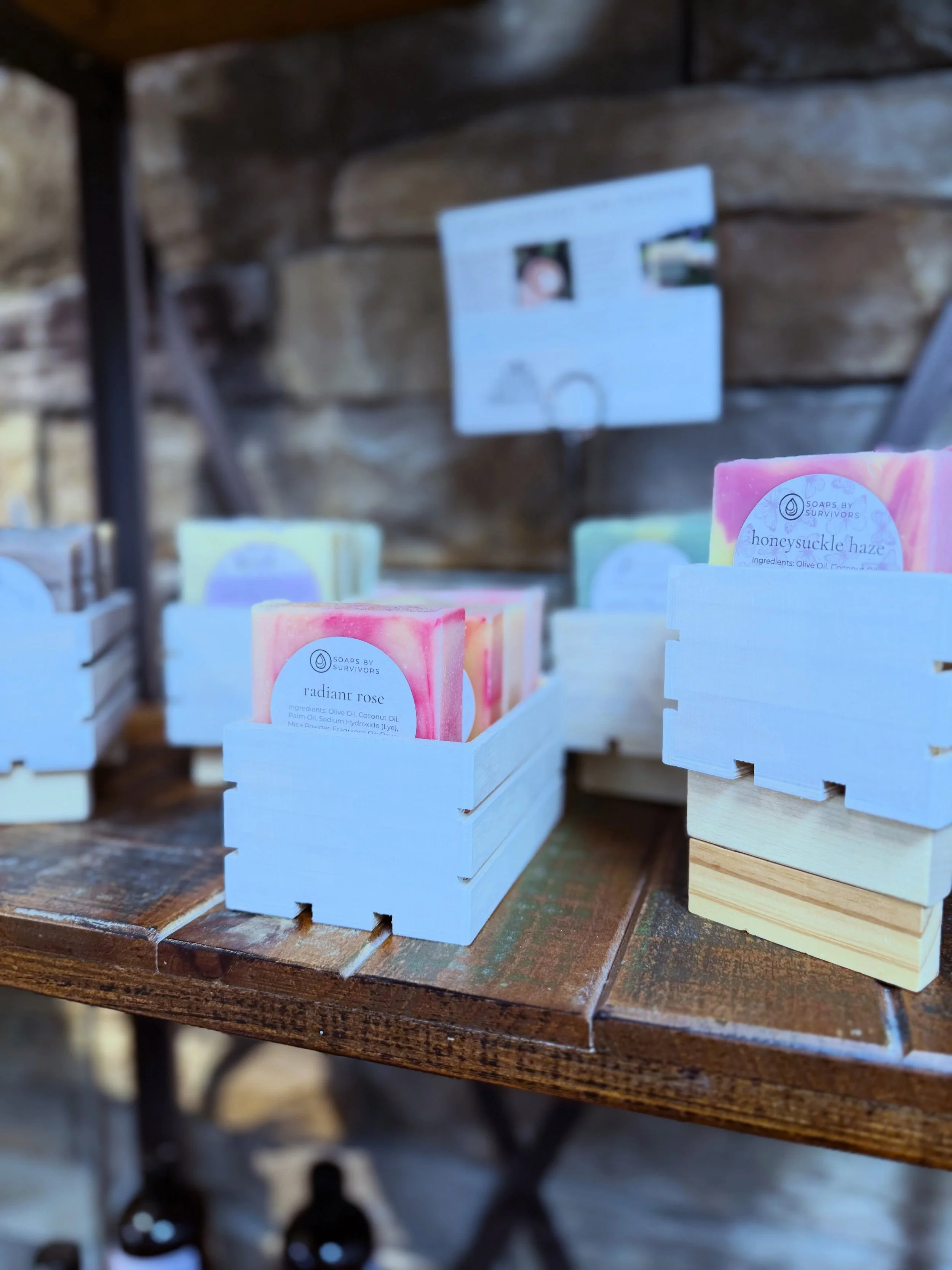 We are so proud to carry Soaps by Survivors products right here at Roots. Soaps by Survivors is a beautiful organization that employs and empowers survivors of exploitation through handcrafted, high-quality bath products &mdash; and every purchase ma