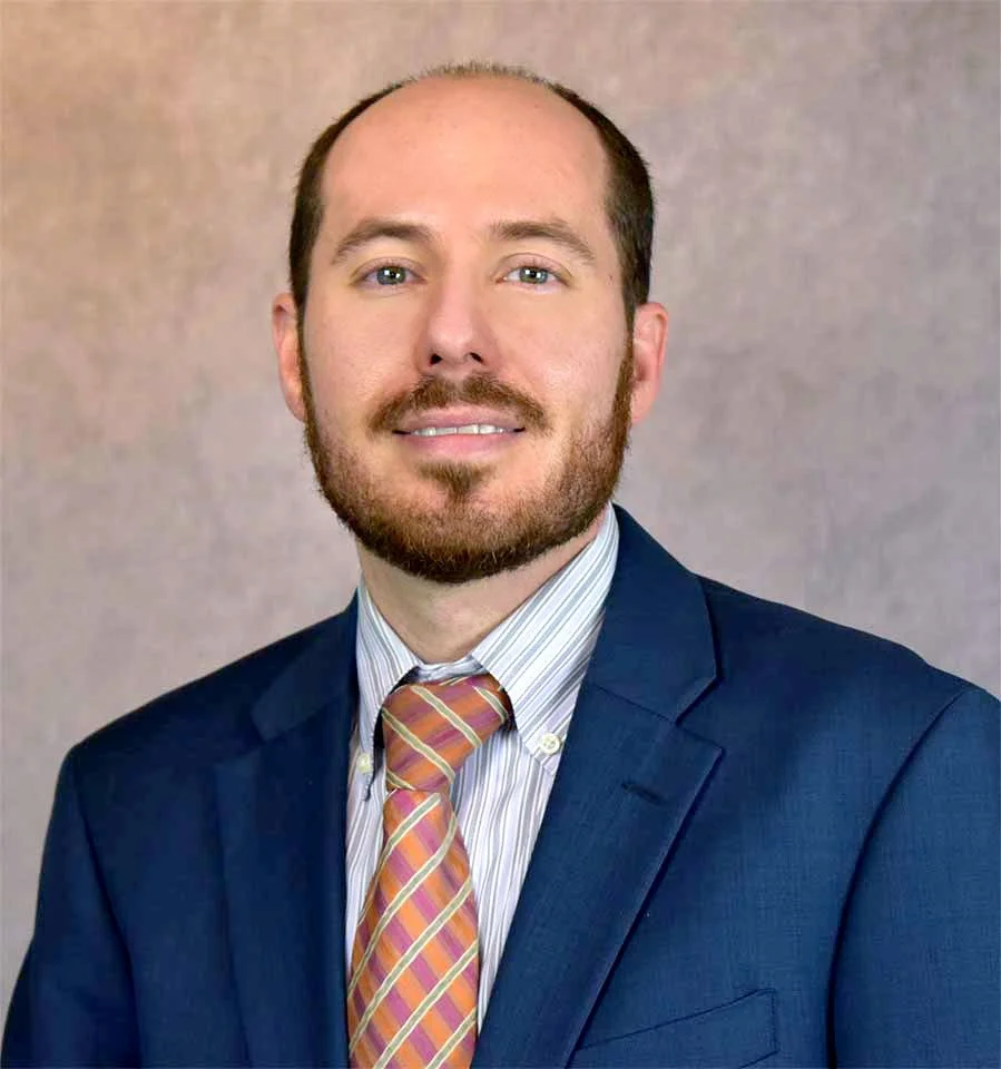 Man wearing a navy suit