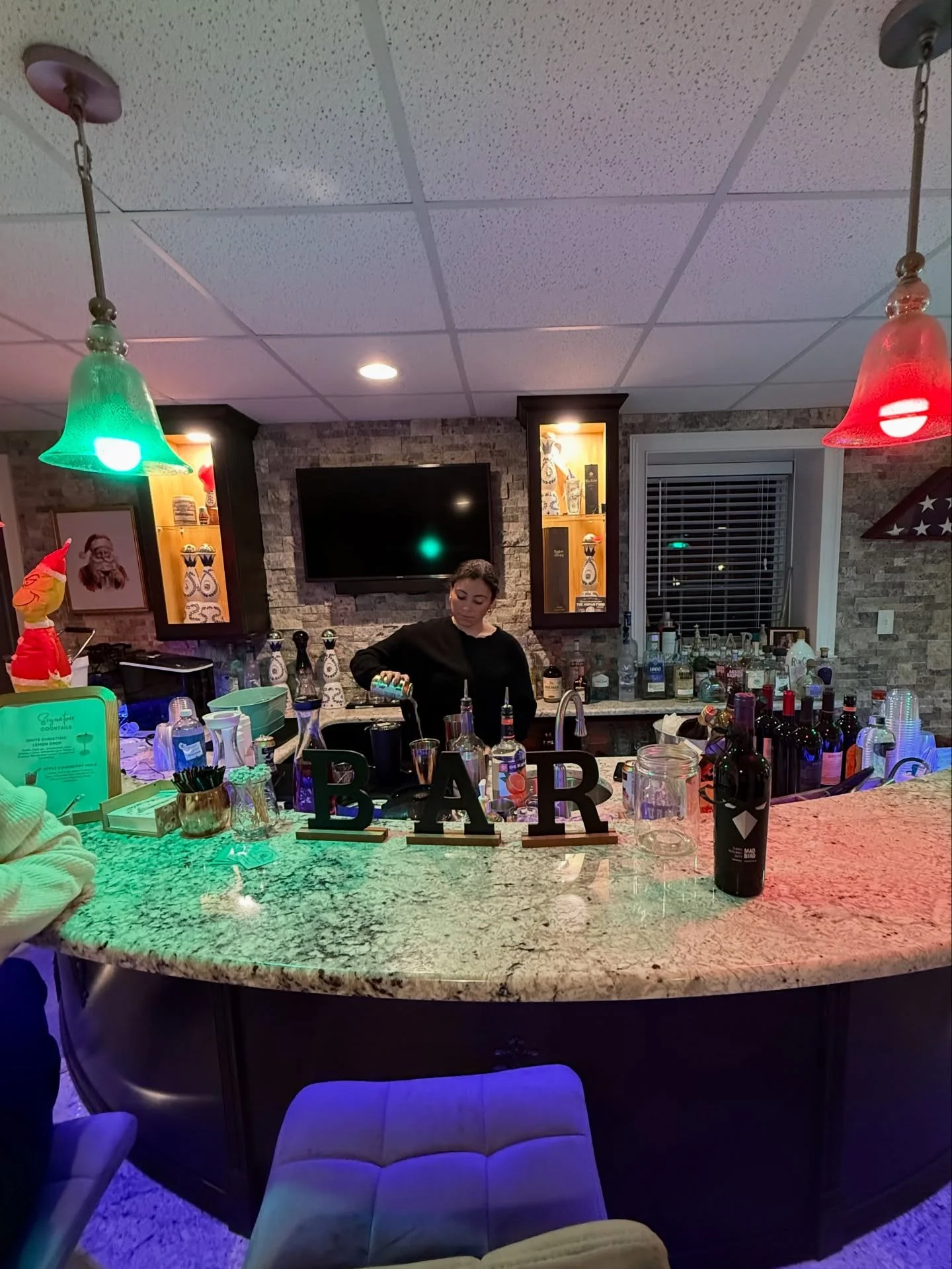 Caila behind the bar tonight for our 3rd time bartending BCA Therapy&rsquo;s annual Christmas party🎄🥂