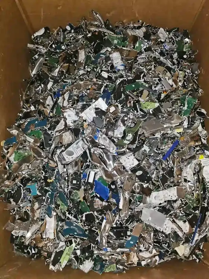 Photo of hard drives shredded by a industrial hard drive shredder