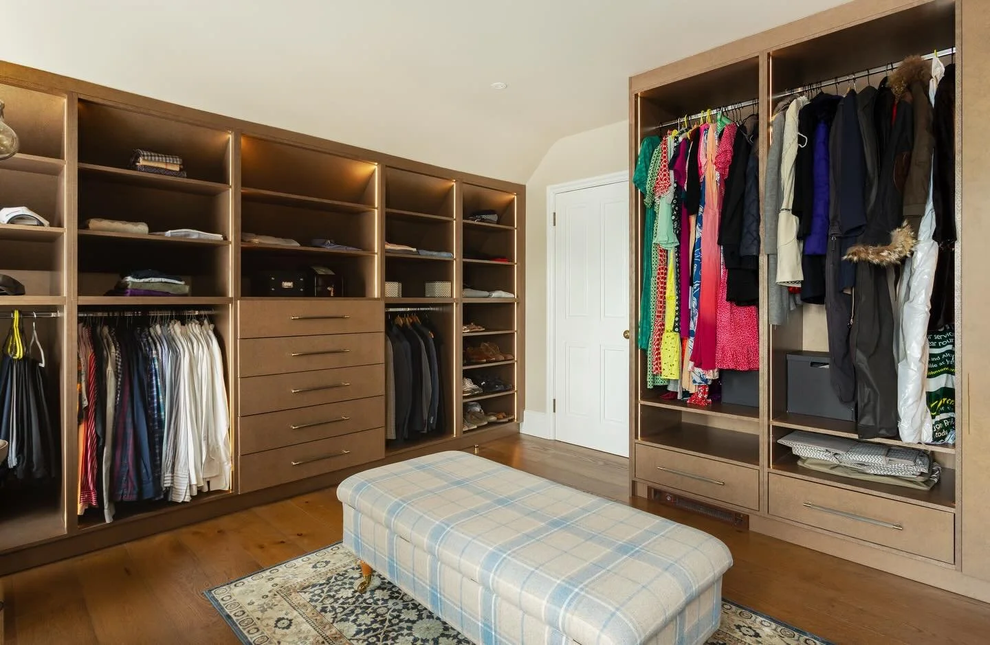 A beautifully calm, fully bespoke dressing room finished in our incredibly unique metallic Cobra Bronze cabinetry - a textured, warm, sculptural surface that shifts with the light and brings real depth to the space.

Designed as part of the large mul