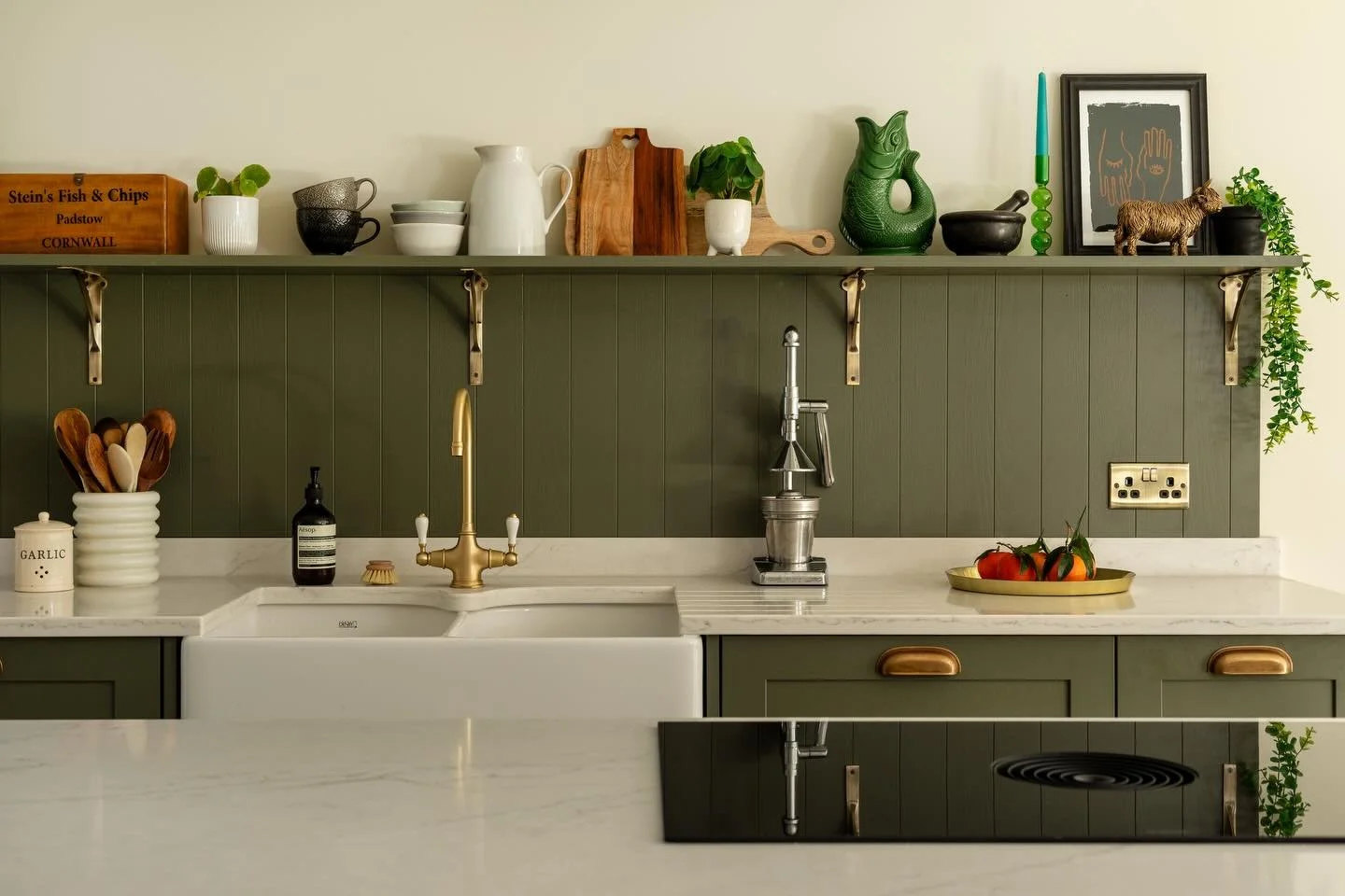 New project now up!

This classic shaker kitchen sits right at the heart of a newly reconfigured family home. Finished in a rich olive green and paired with warm brass detailing, it balances timeless character with everyday practicality.

From the ge
