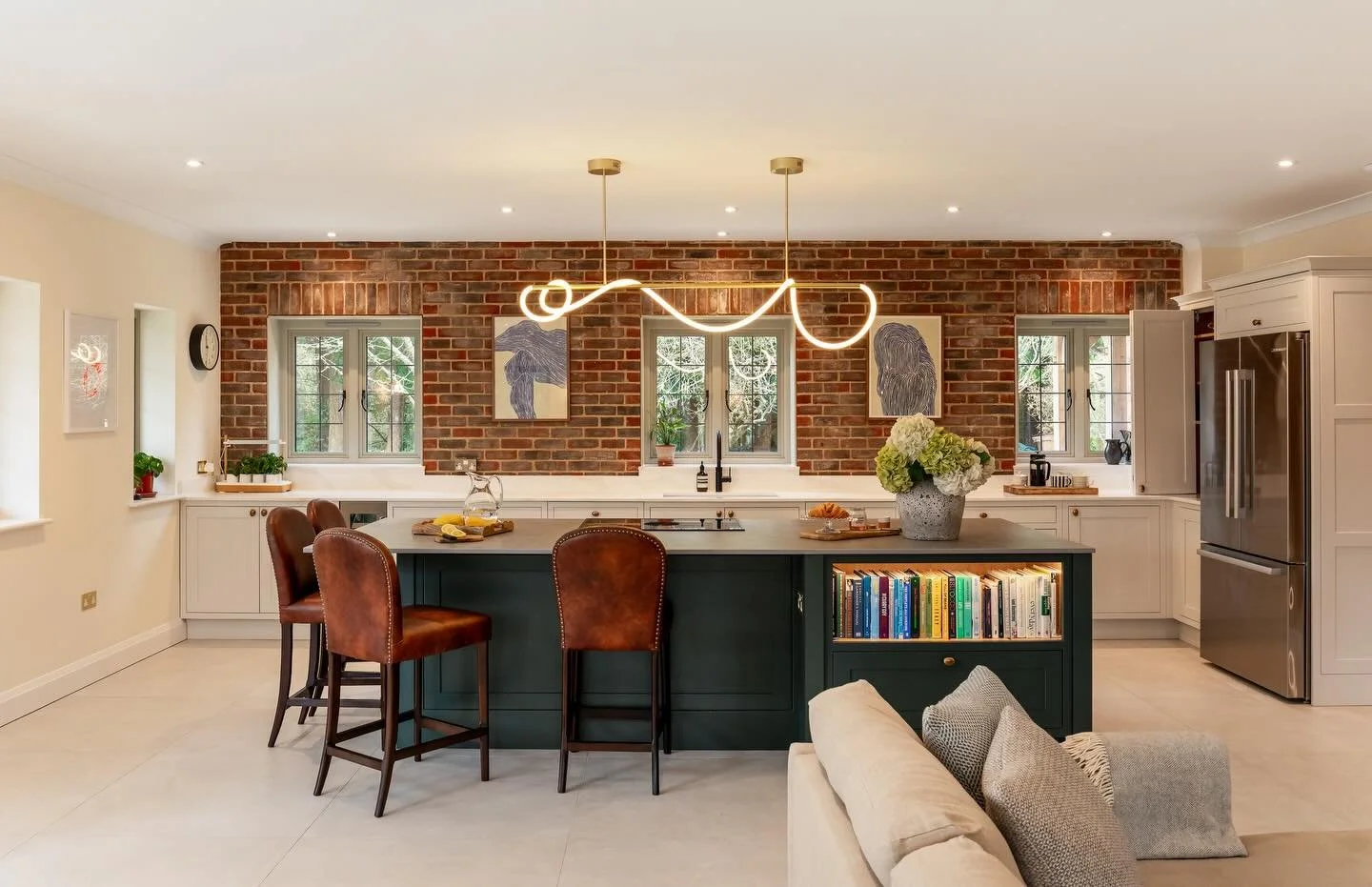 A kitchen that balances classic detail with a more relaxed, open feel.

Our Newbridge in-frame shaker, painted in Little Greene Slaked Lime Mid, paired with a Heritage Green island to bring depth and contrast. We kept the main run at base level only 